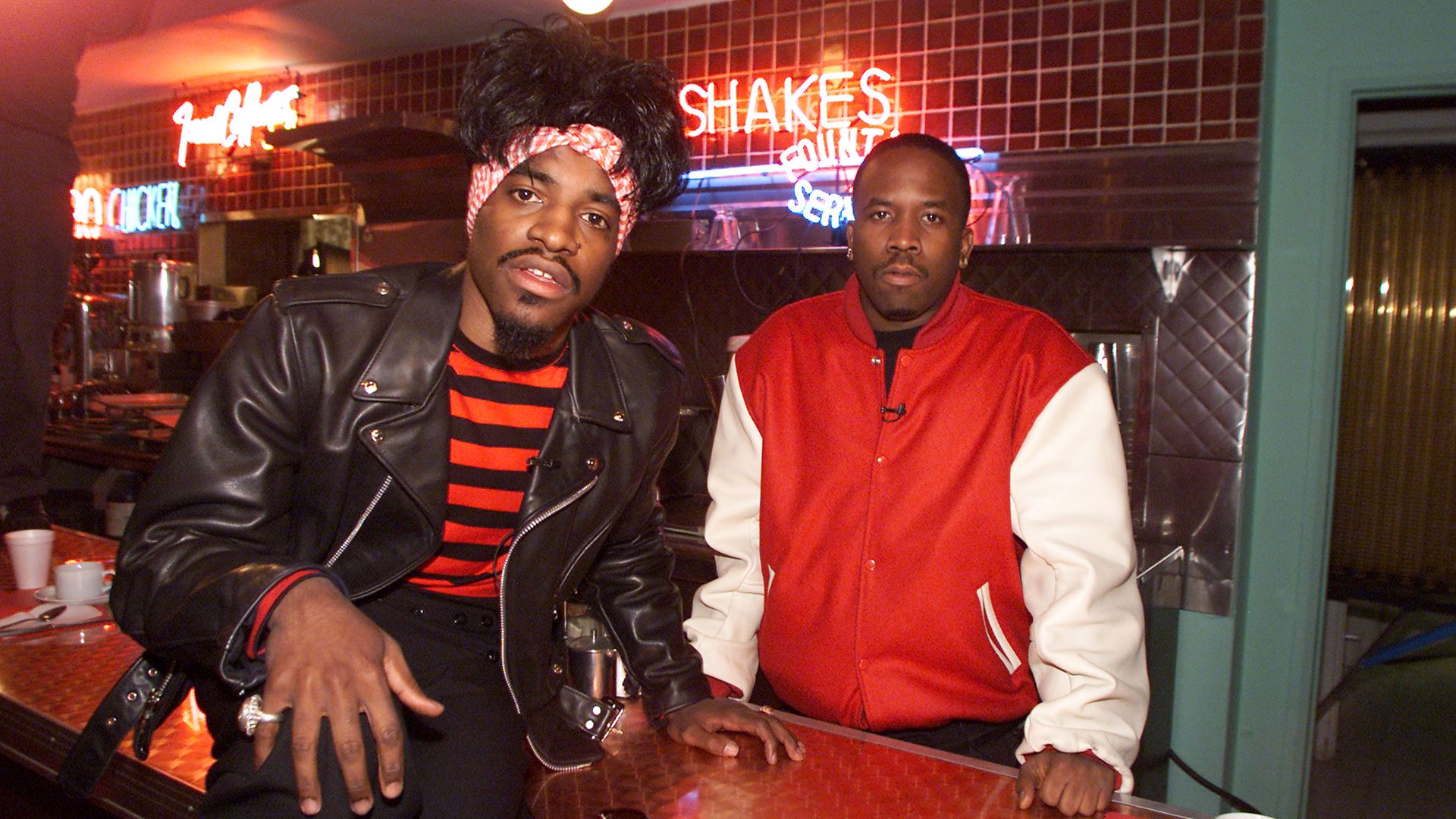 Andre 3000 and Big Boi of Outkast pose for a photo. 