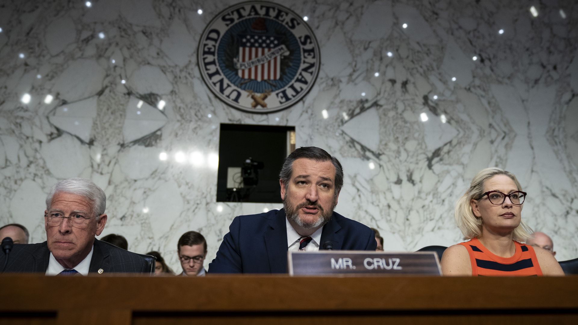 Lawmakers at the dais