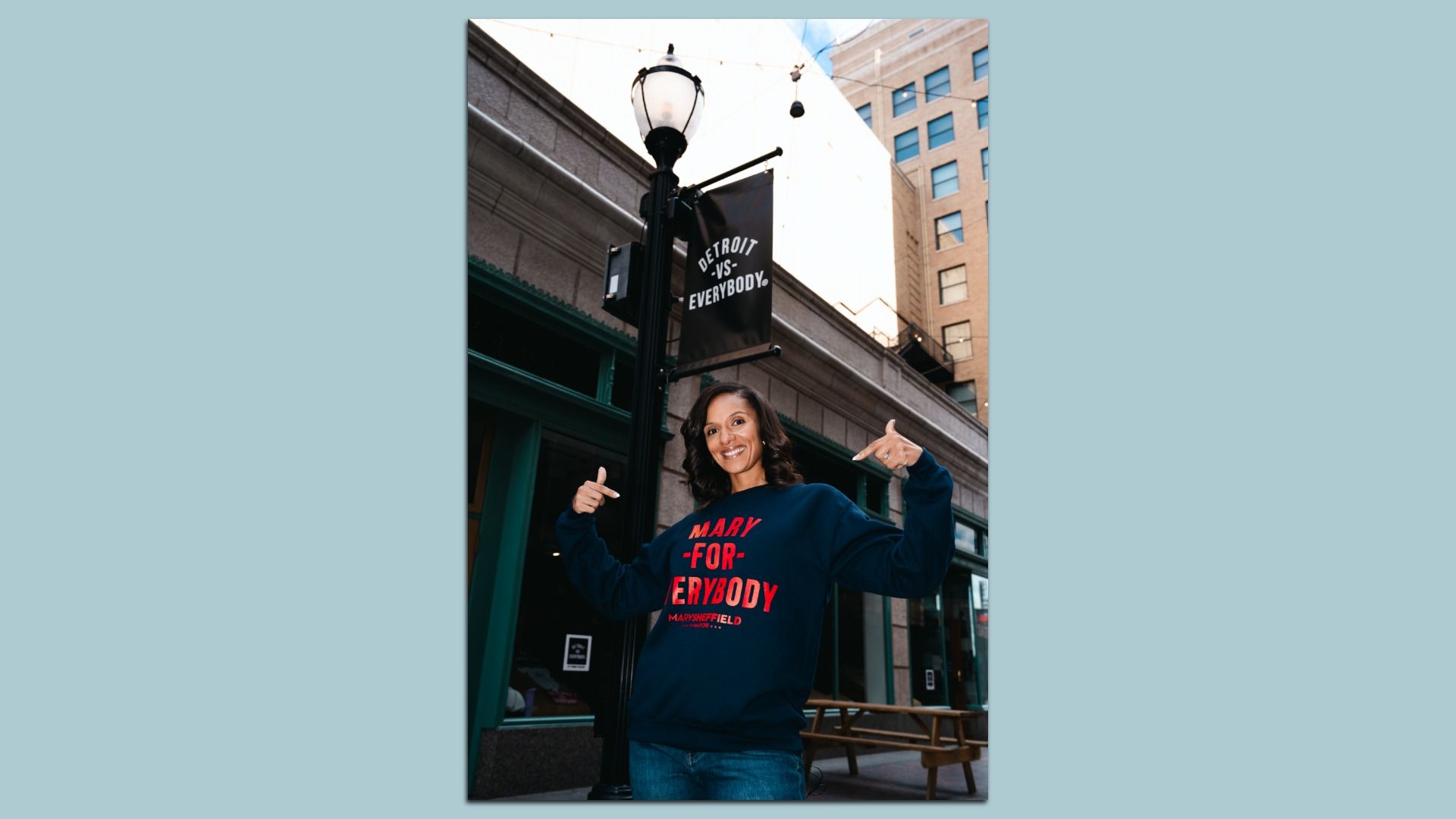 Sheffield poses in a Mary for Everybody sweatshirt