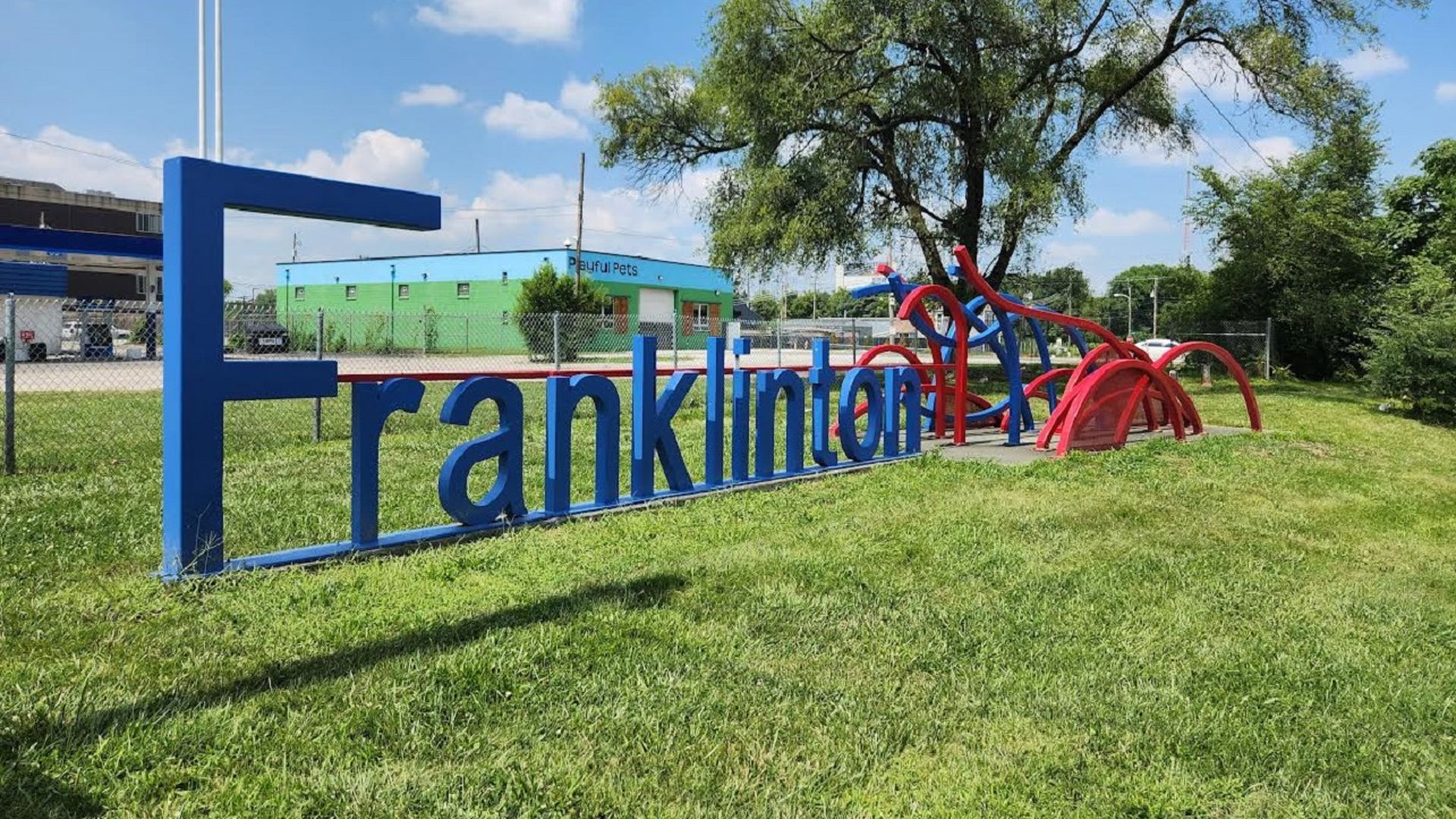 A colorful sign reading "Franklinton" in that neighborhood.