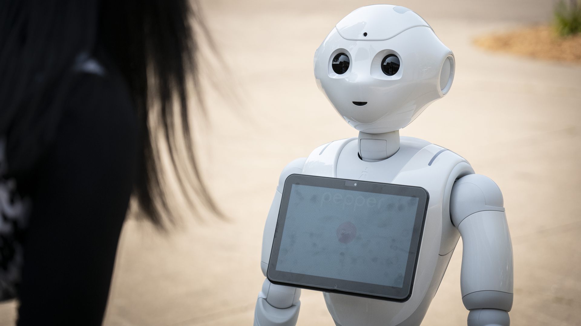 white robot with screen