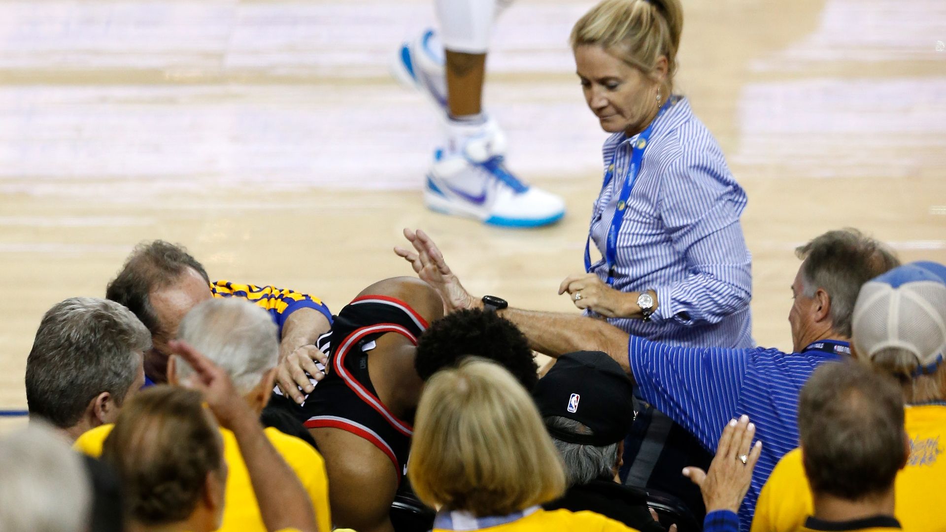 Warriors investor Mark Stevens pushing Raptors player Kyle Lowry