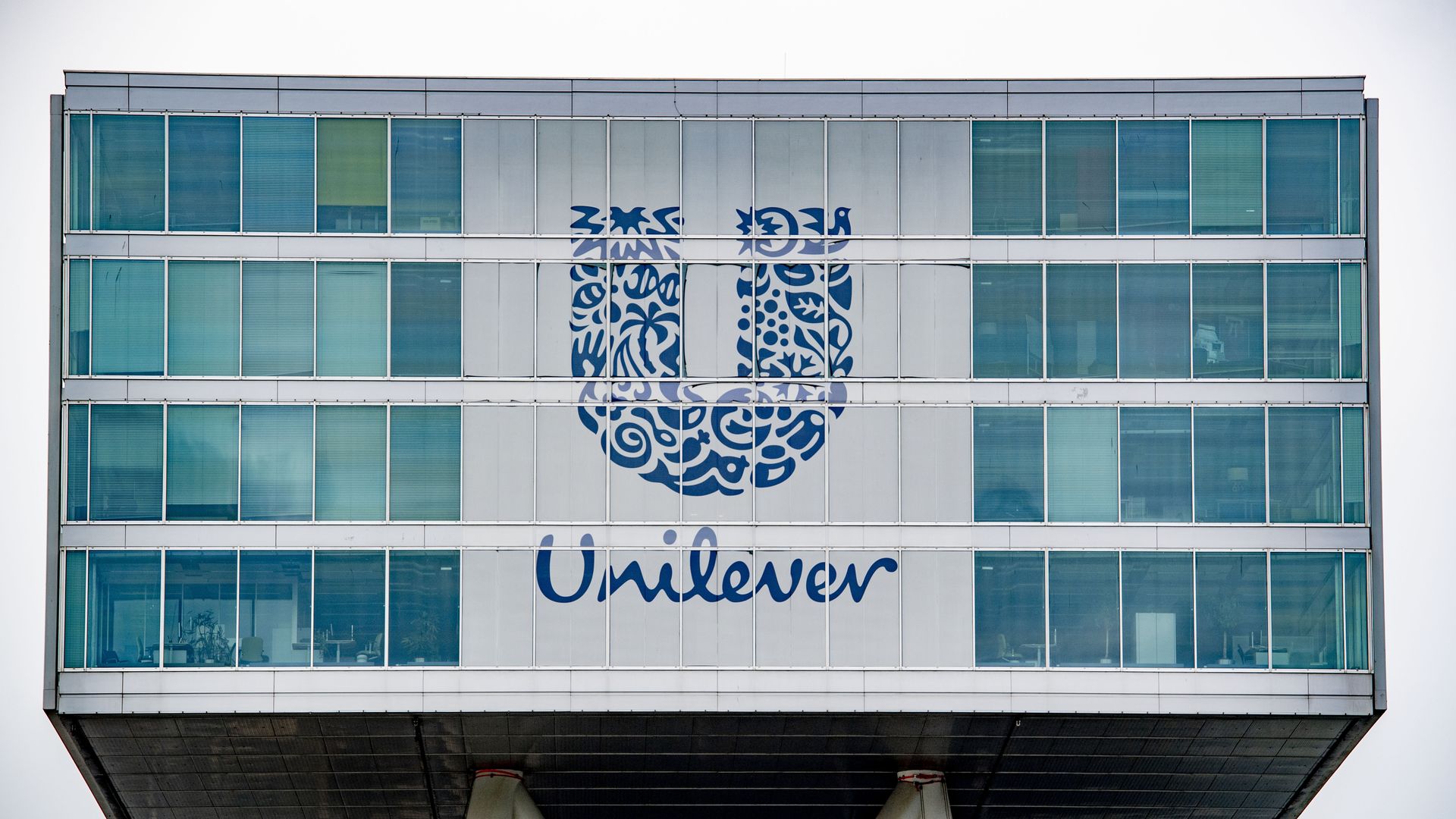 A Unilever logo on a building