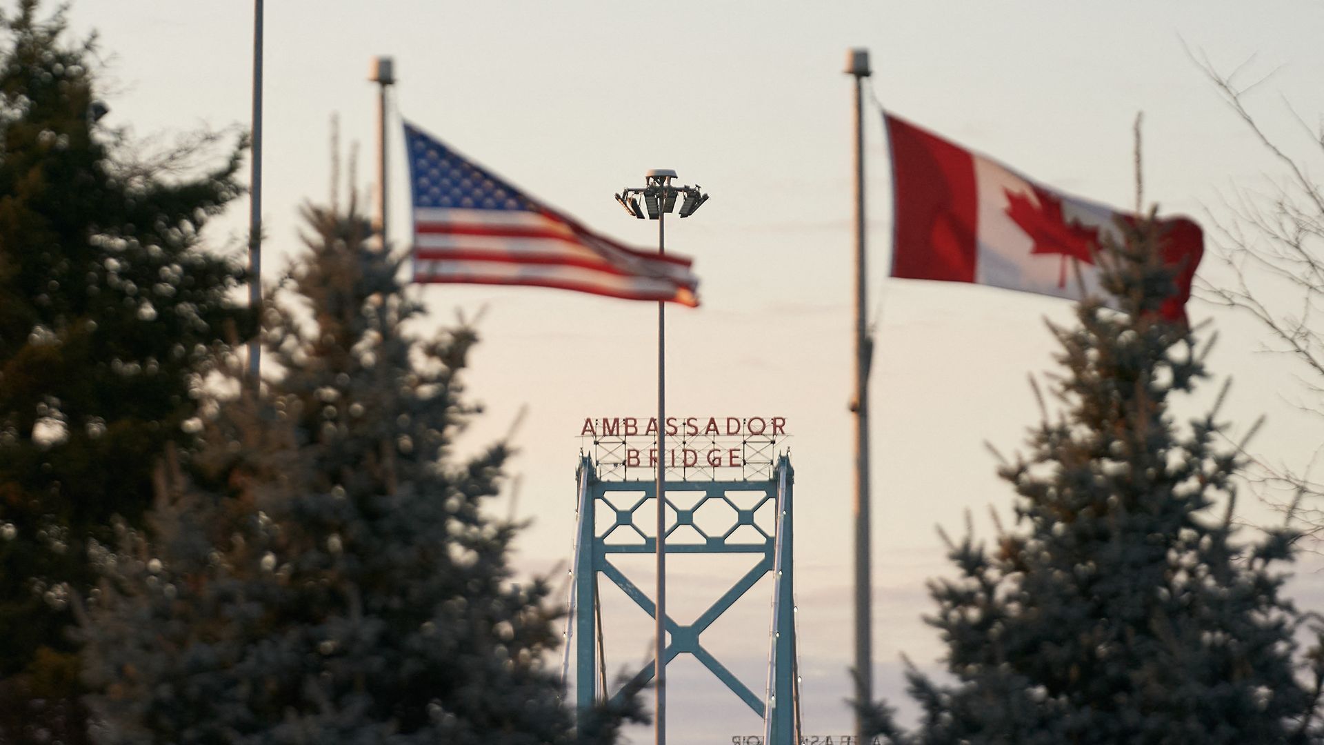 Flags fly over the Ambassador Bridge in Windsor, Ontario. 