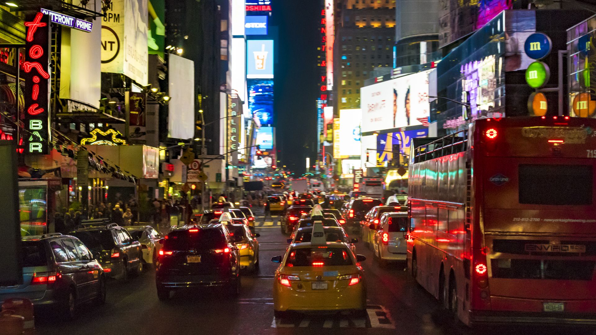 Night view of Times Square, New York City with traffic