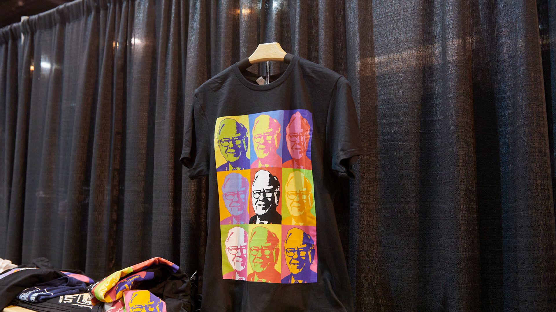 A t-shirt featuring Warren Buffett's image on sale at his company's annual shareholder meeting.