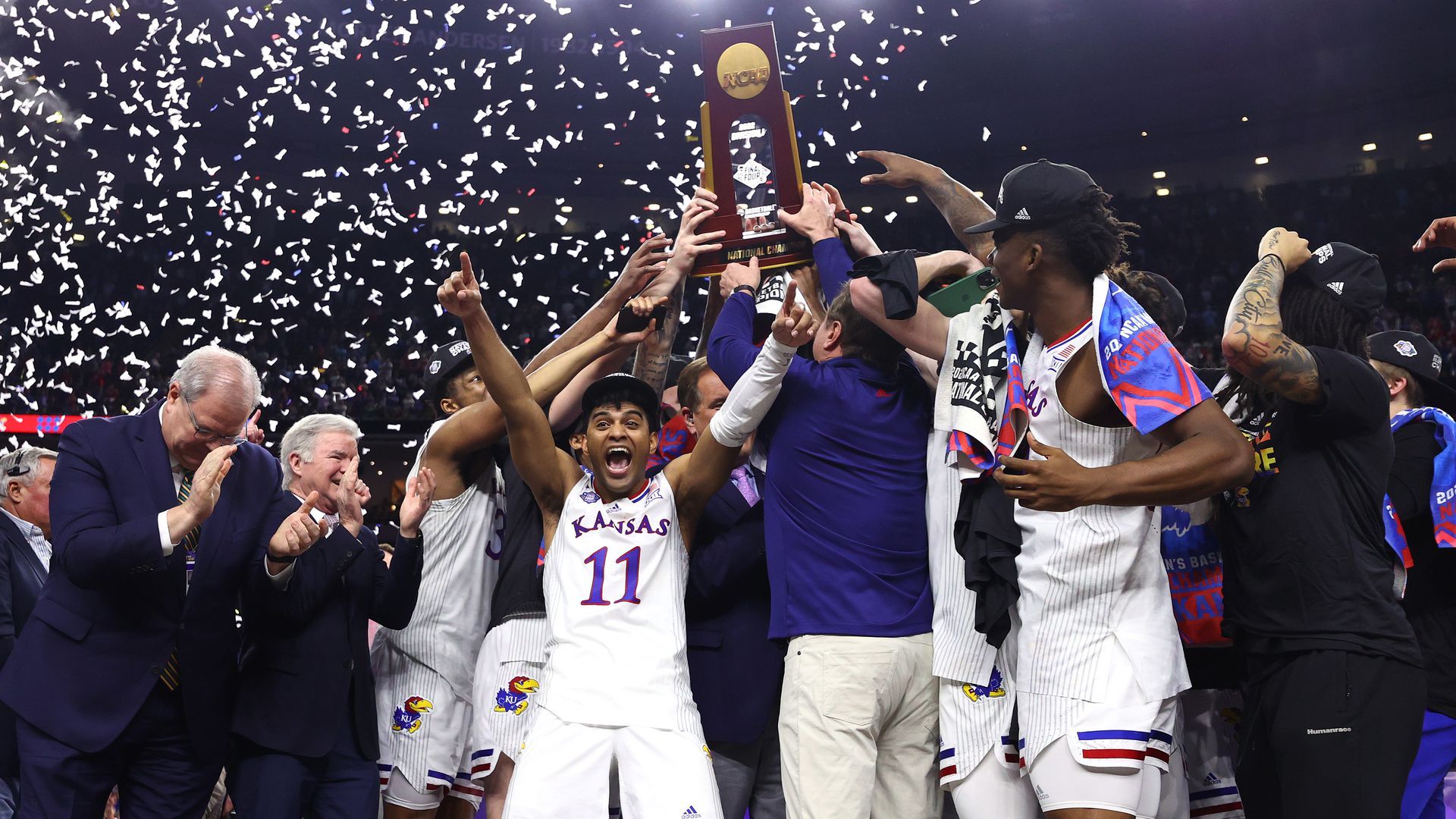 Kansas holding the trophy after winning the national championship.