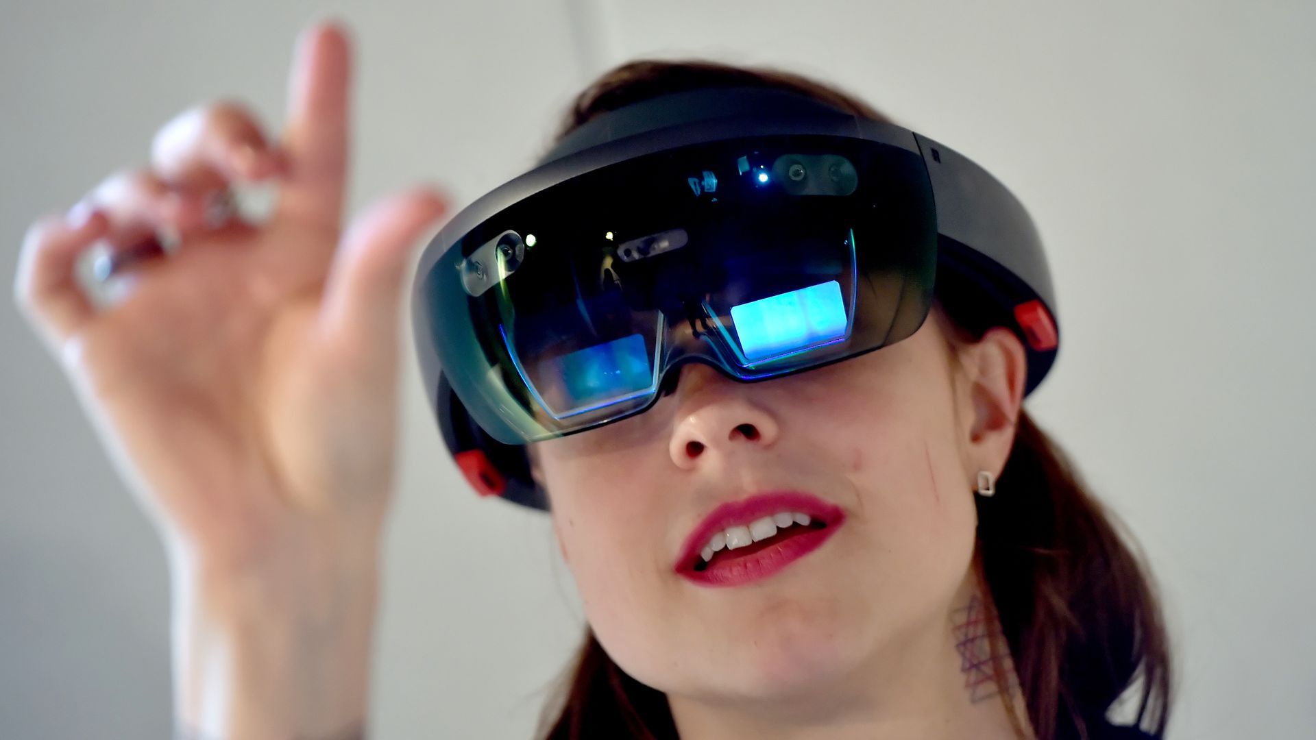 A women wearing Microsoft's HoloLens mixed reality headset