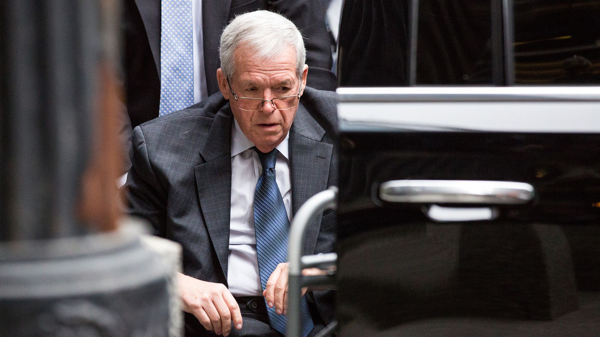 Photo of Dennis Hastert sitting in a chair