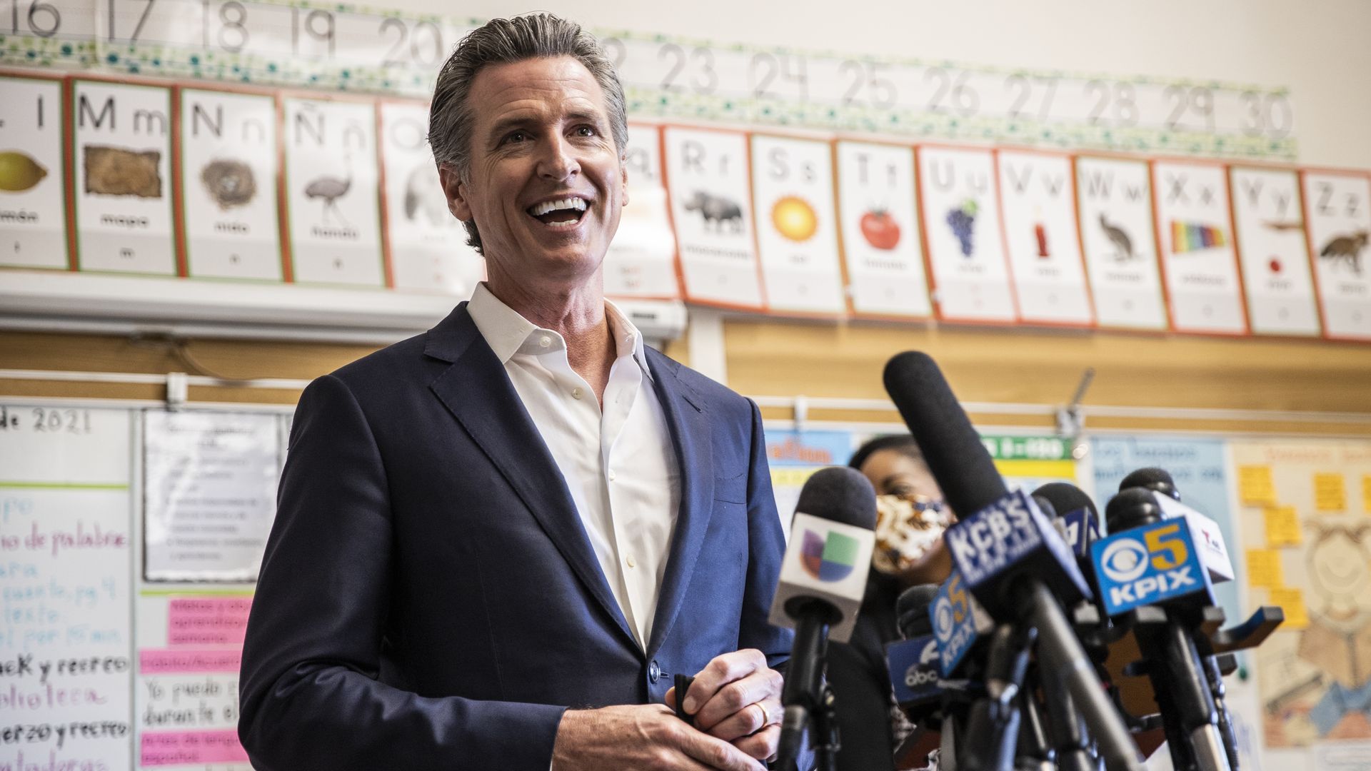 California Governor Gavin Newsom speaks to members of the media after meeting students at Melrose Leadership Academy during a school visit in Oakland, California on Wednesday, Sept. 15