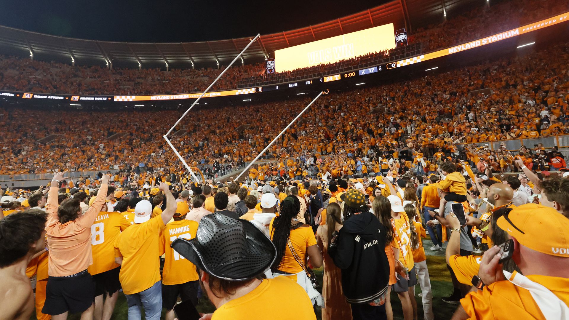 Tennessee Volunteers fans tear down the goal post after defeating the Alabama Crimson Tide 24-17 at Neyland Stadium on October 19, 2024 in Knoxville, Tennessee. (Photo by Butch Dill/Getty Images)