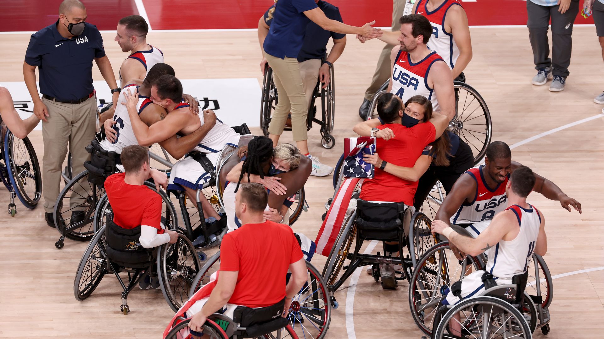  Team USA celebrate after defeating Team Japan during the men's Wheelchair Basketball gold medal game at the Tokyo Paralympic Games in Ariake Arena on Sunday.