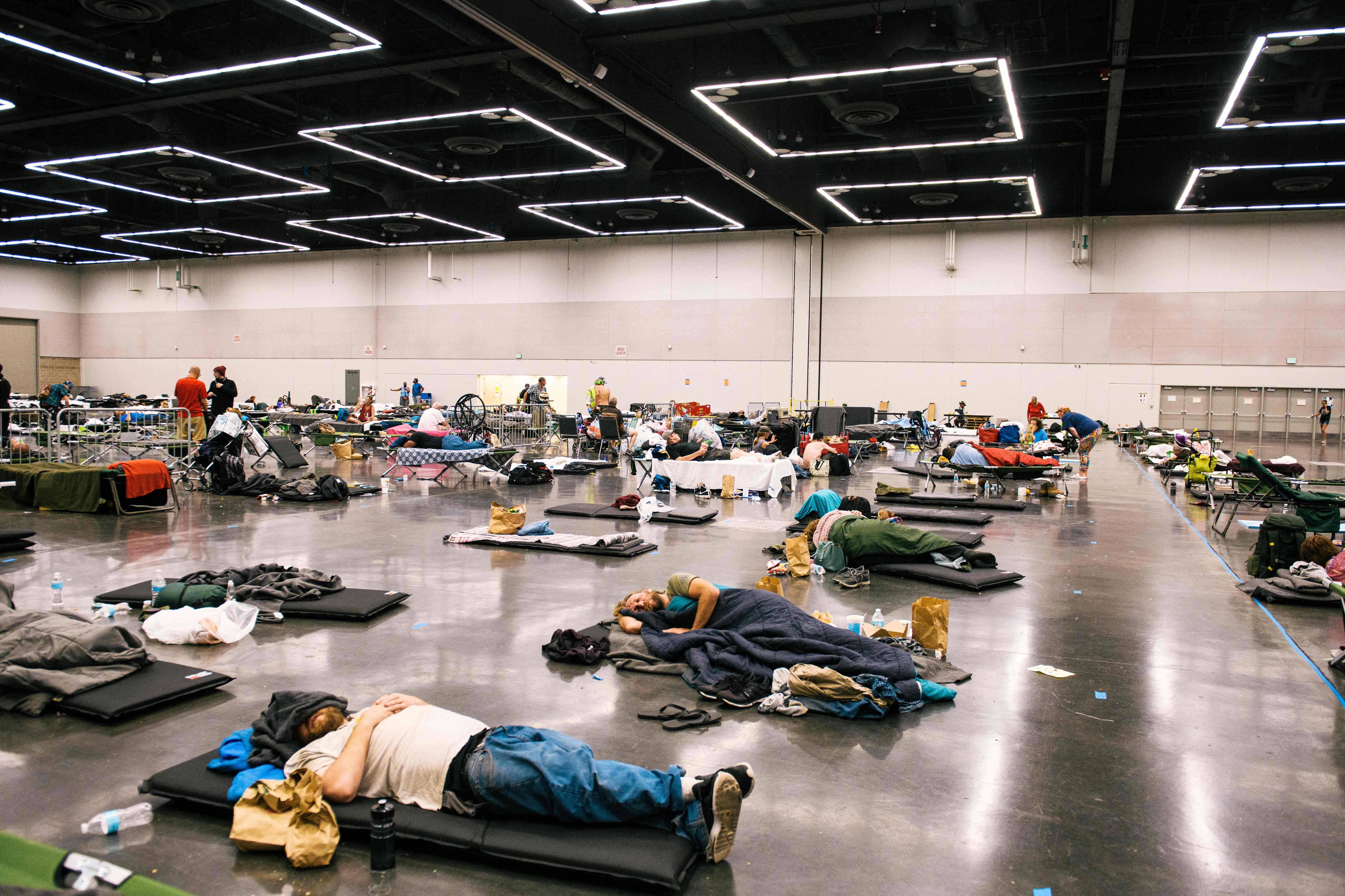 People resting at a cooling station in Portland, Oregon, during a extreme heatwave in July 2021.