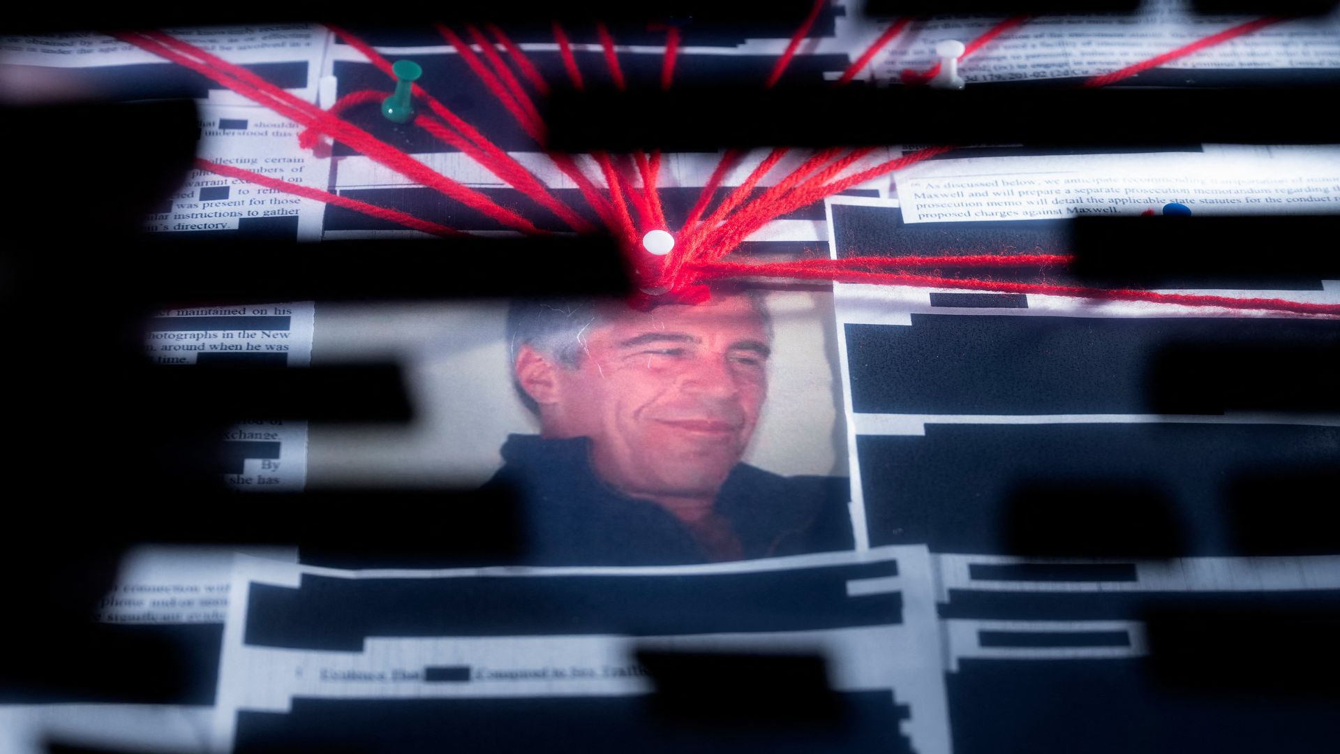A stack of heavily redacted Justice Department documents from the Epstein Library displayed in a photo illustration against a dark background.
