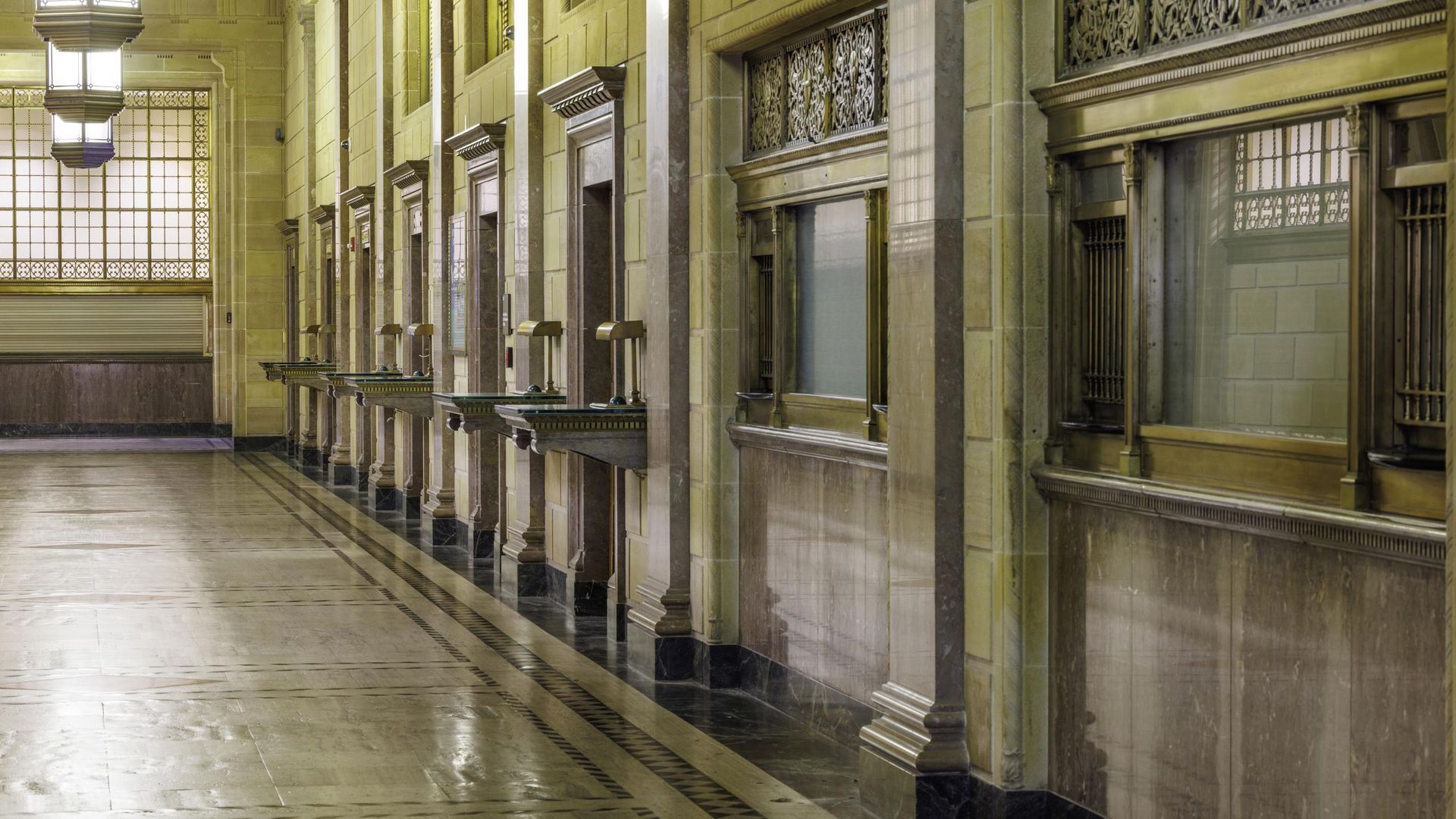 A photo of an empty room with windows for interactions 