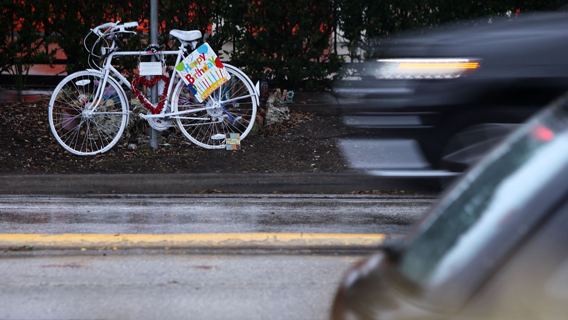 A white ghost bike honoring a dead cyclist on a Houston street