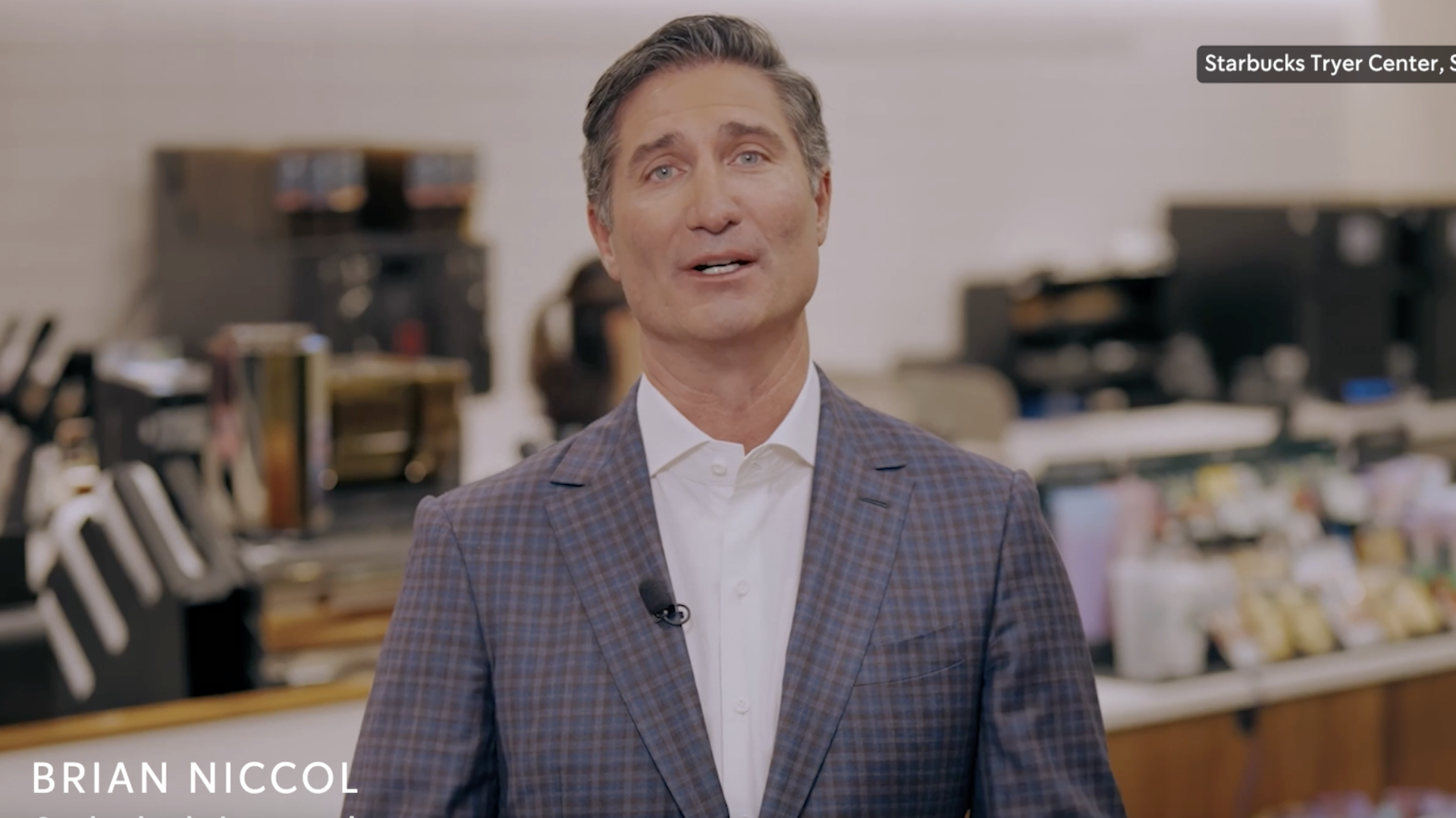 Screenshot of Starbucks CEO Brian Niccol speaking direct to camera. 