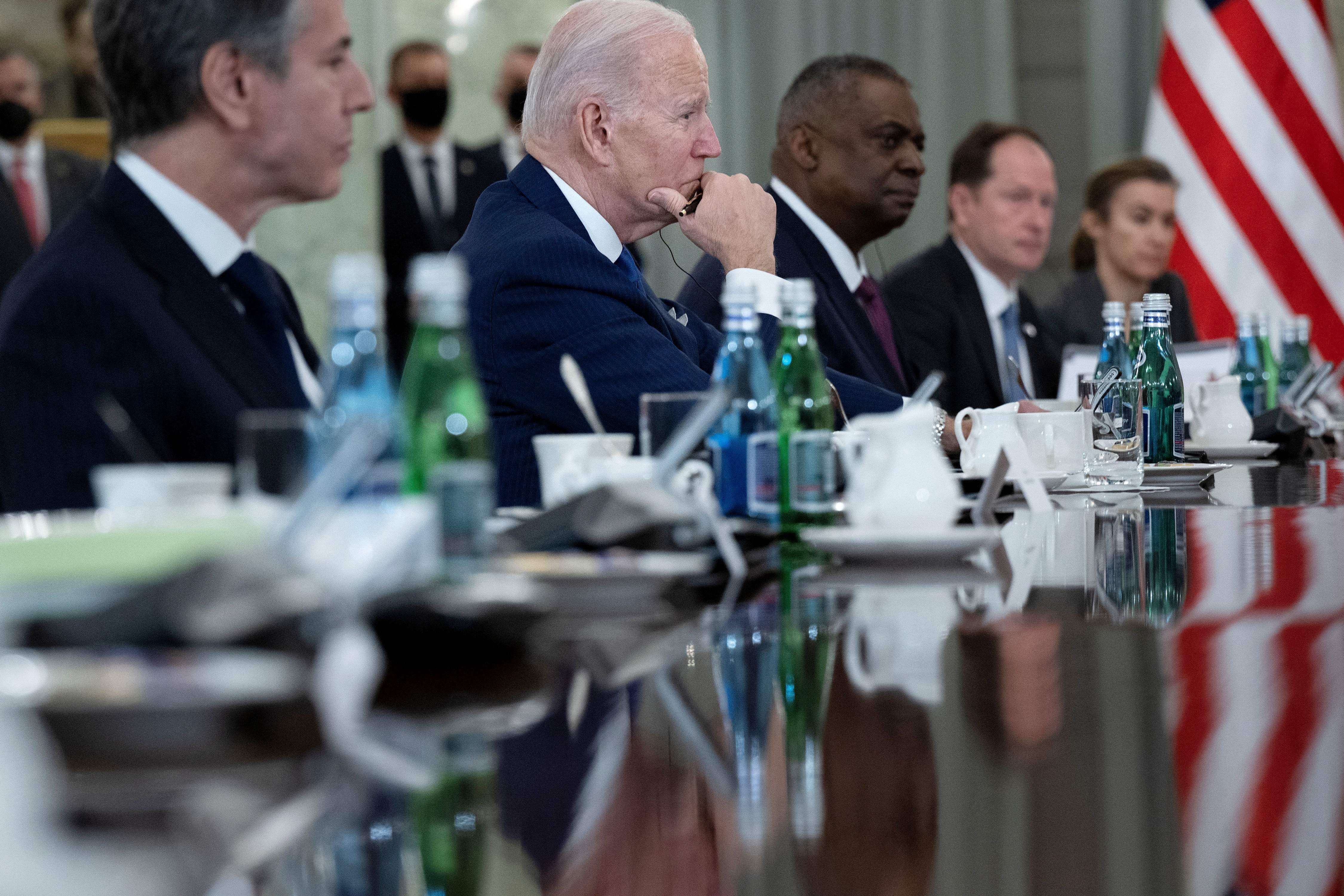 S Secretary of State Antony Blinken, US President Joe Biden, and US Secretary of Defence Lloyd Austin listen during a meeting on Russia's war on Ukraine.