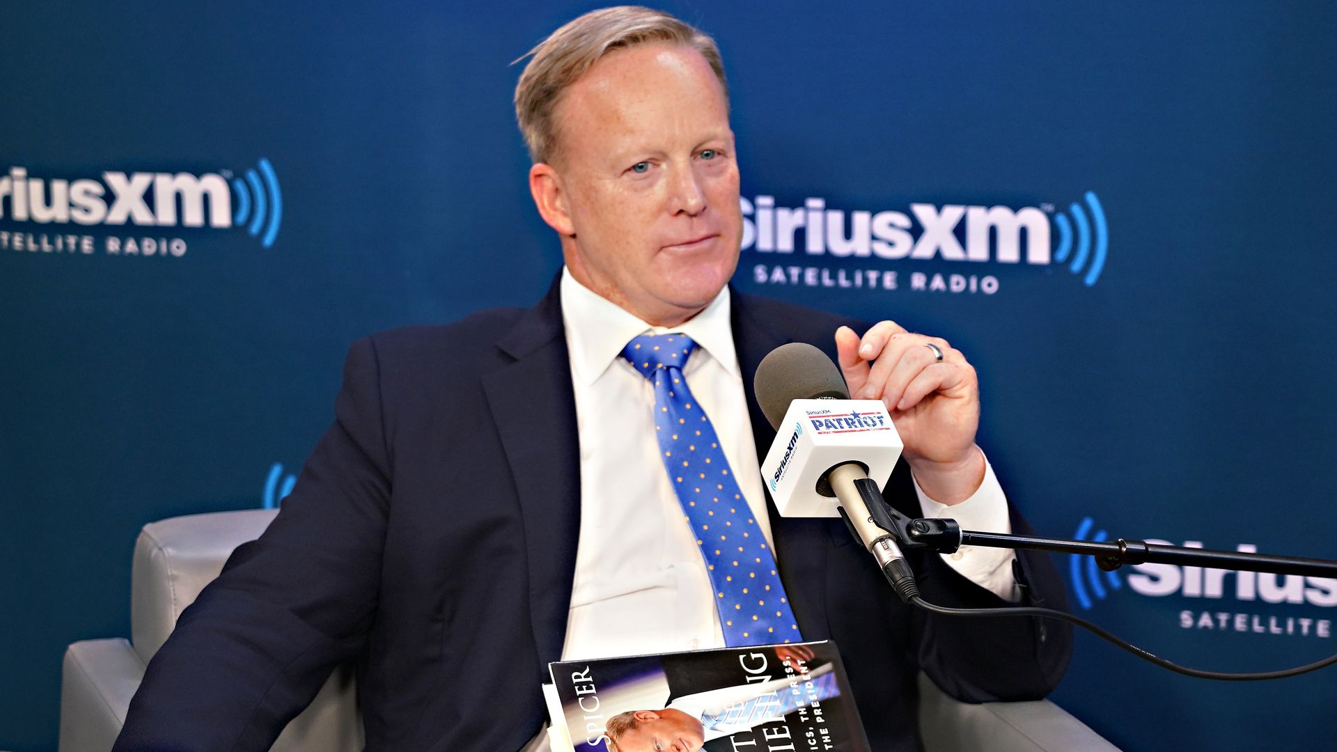 Sean Spicer talks to host David Webb during a SiriusXM Patriot Forum at the SiriusXM Studios on July 23, 2018 in New York City.