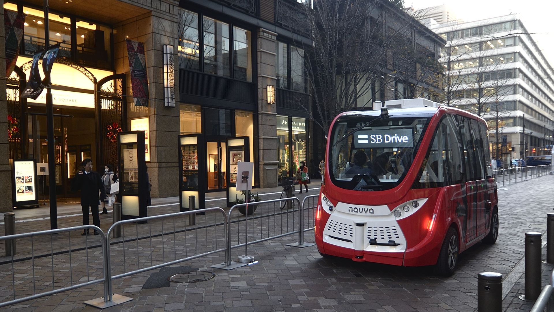 Self-driving electric vehicle, Navya Arma, developed by a French company Navya Technologies SAS, during the first test drive on a public road in Tokyo, Japan on December 22, 2017.