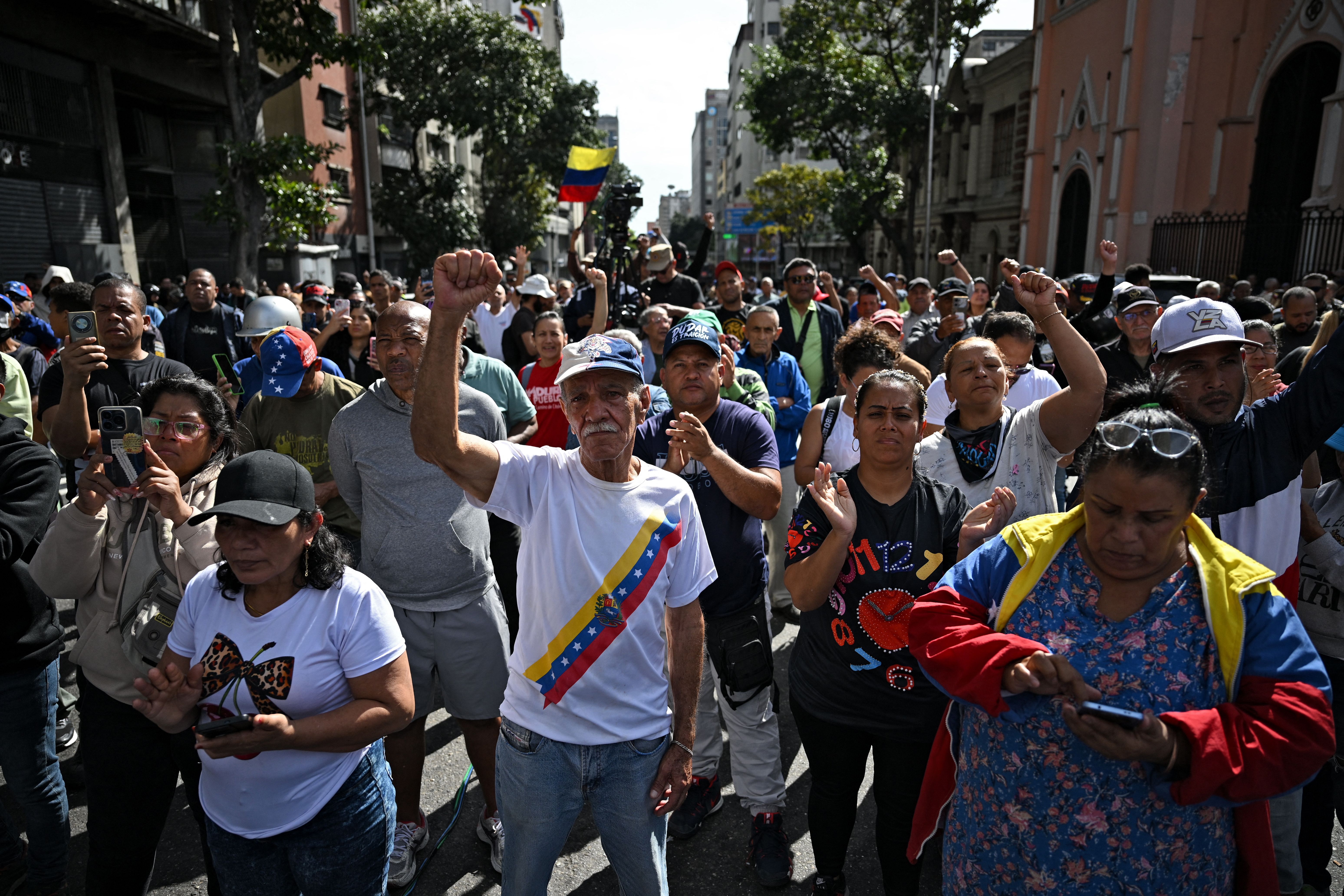Supporters of Venezuelan President Nicolás Maduro gather in Caracas on Jan. 3, 2026