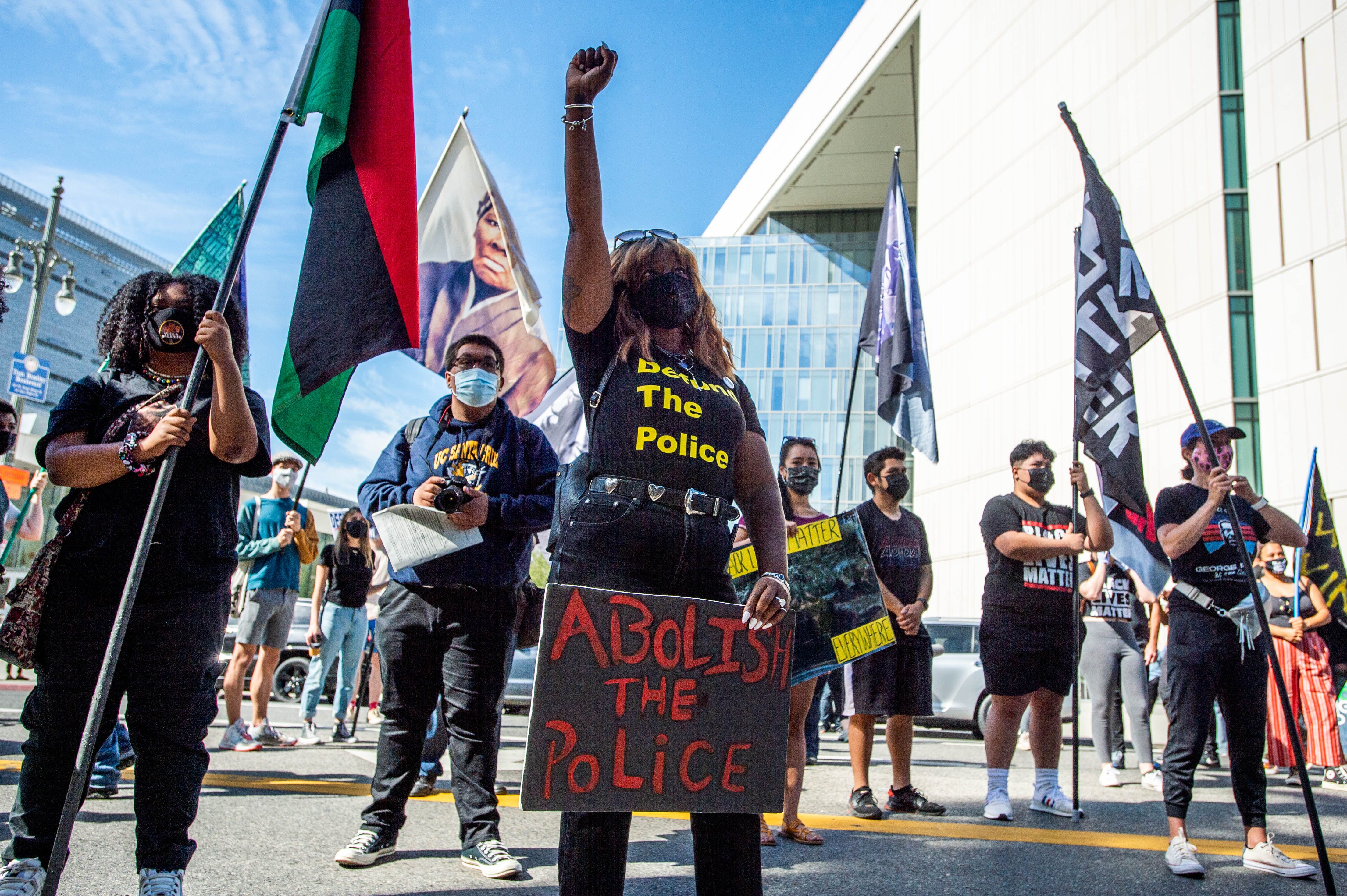 Black Lives Matter supporters take to the streets in Los Angeles outside LAPD Headquarters during the first anniversary of George Floyd"u2019s death on Tuesday, May 25