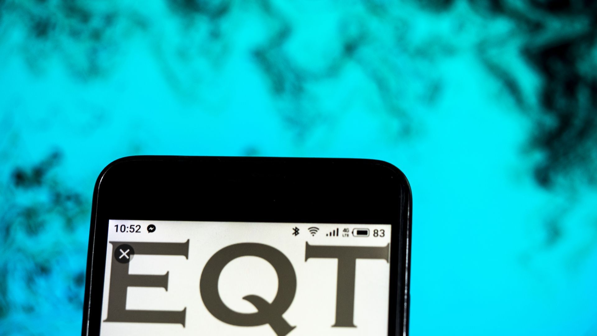 Phone that says EQT on it