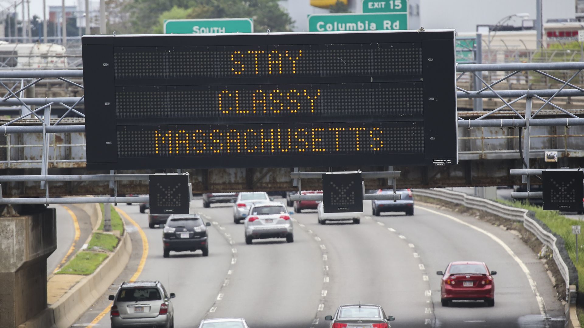 image shows an electronic sign that says "Stay classy massachusetts"