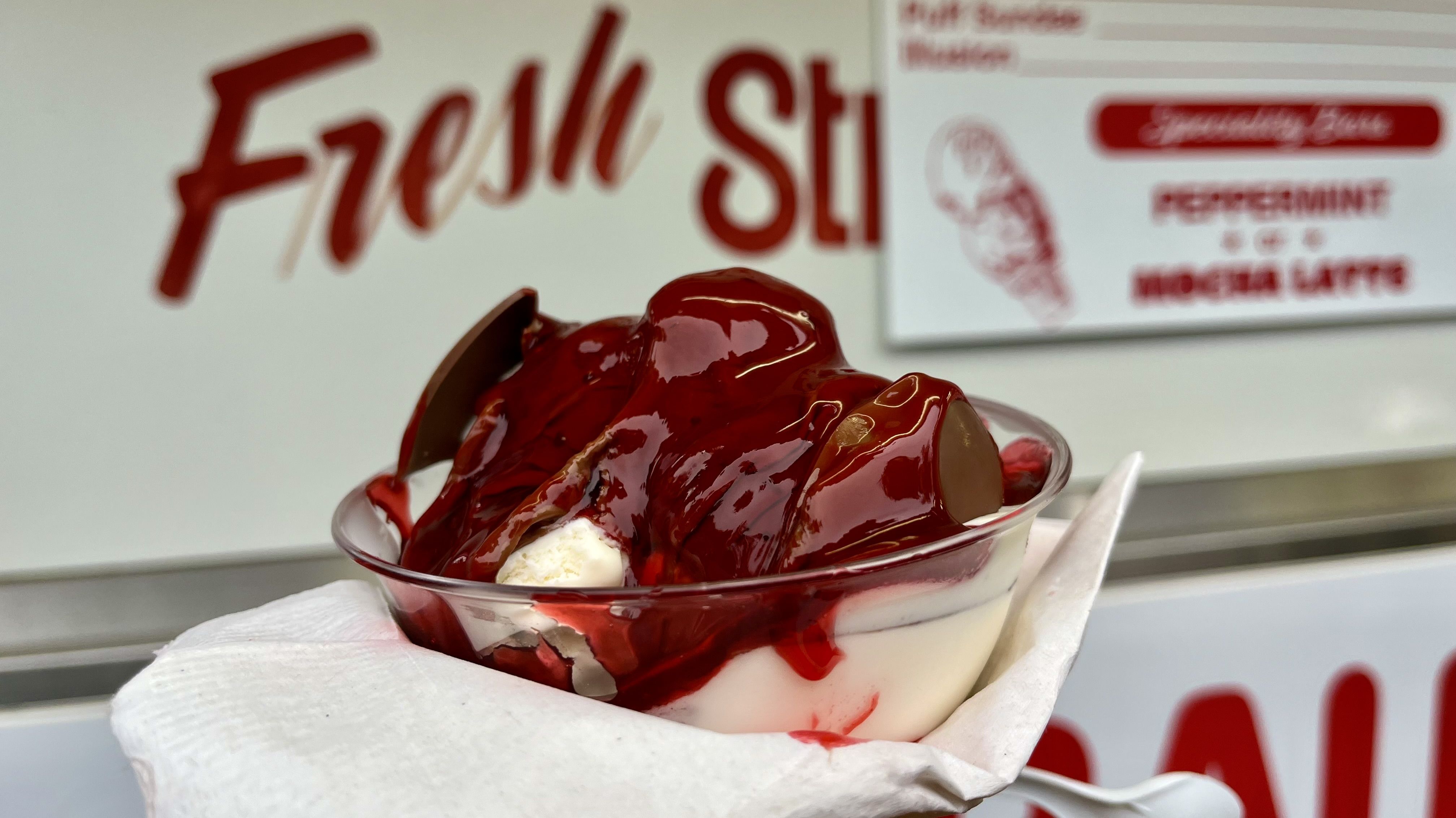 Strawberry sundae ice cream in a bowl