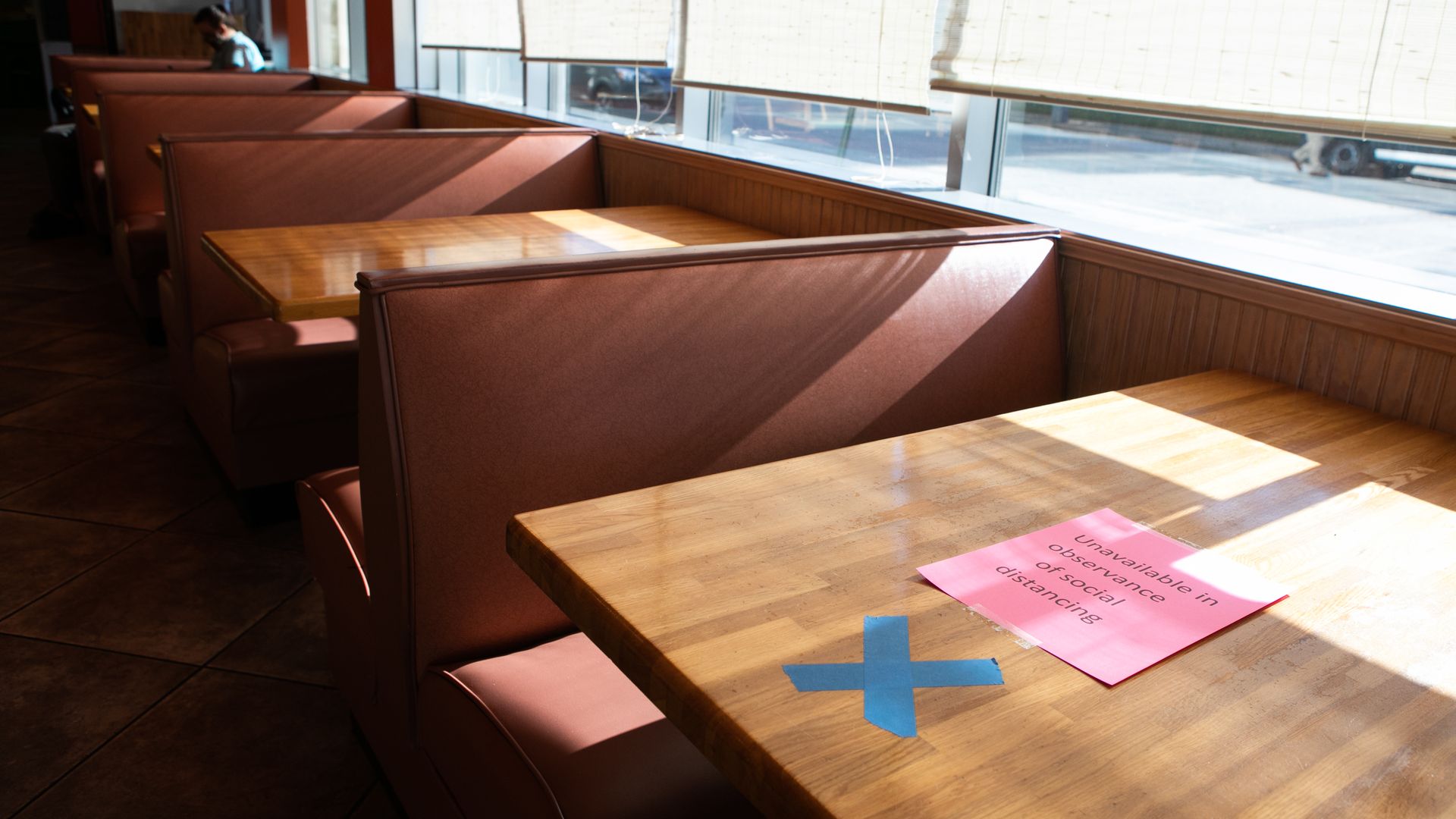 Empty booths at a restaurant in Decatur, Georgia