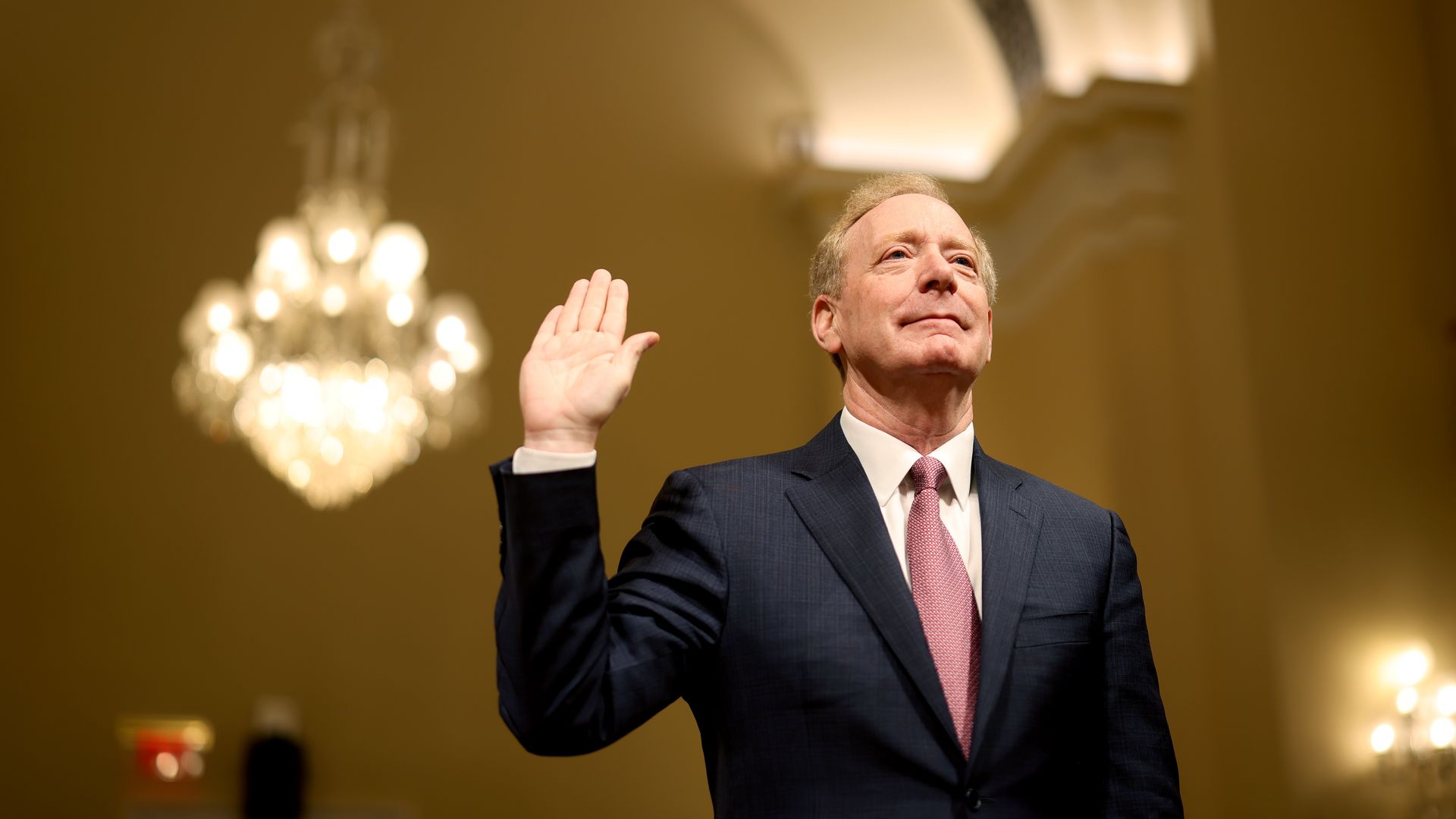 Microsoft president Brad Smith being sworn in for a House Homeland Security hearing on June 13