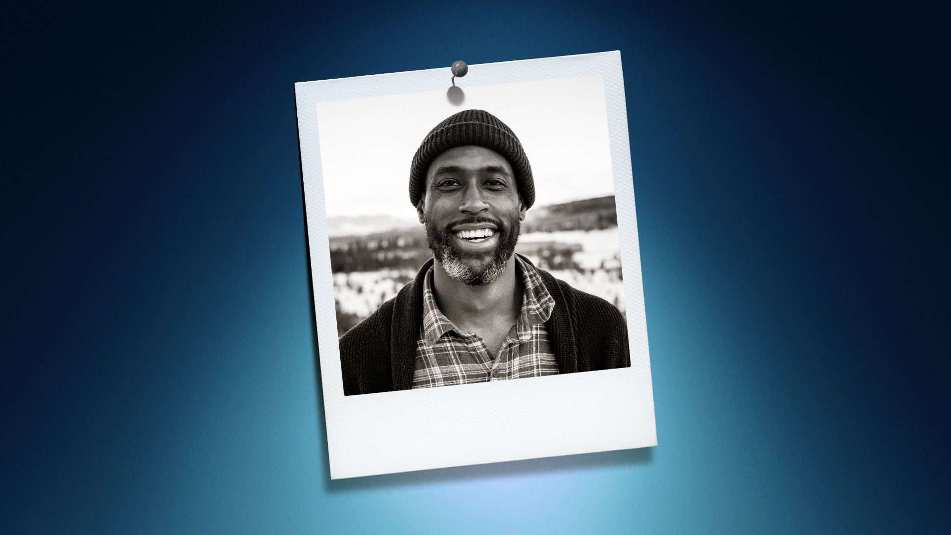 Photo illustration of Jason Swann in the center of a Polaroid photo under a green spotlight.