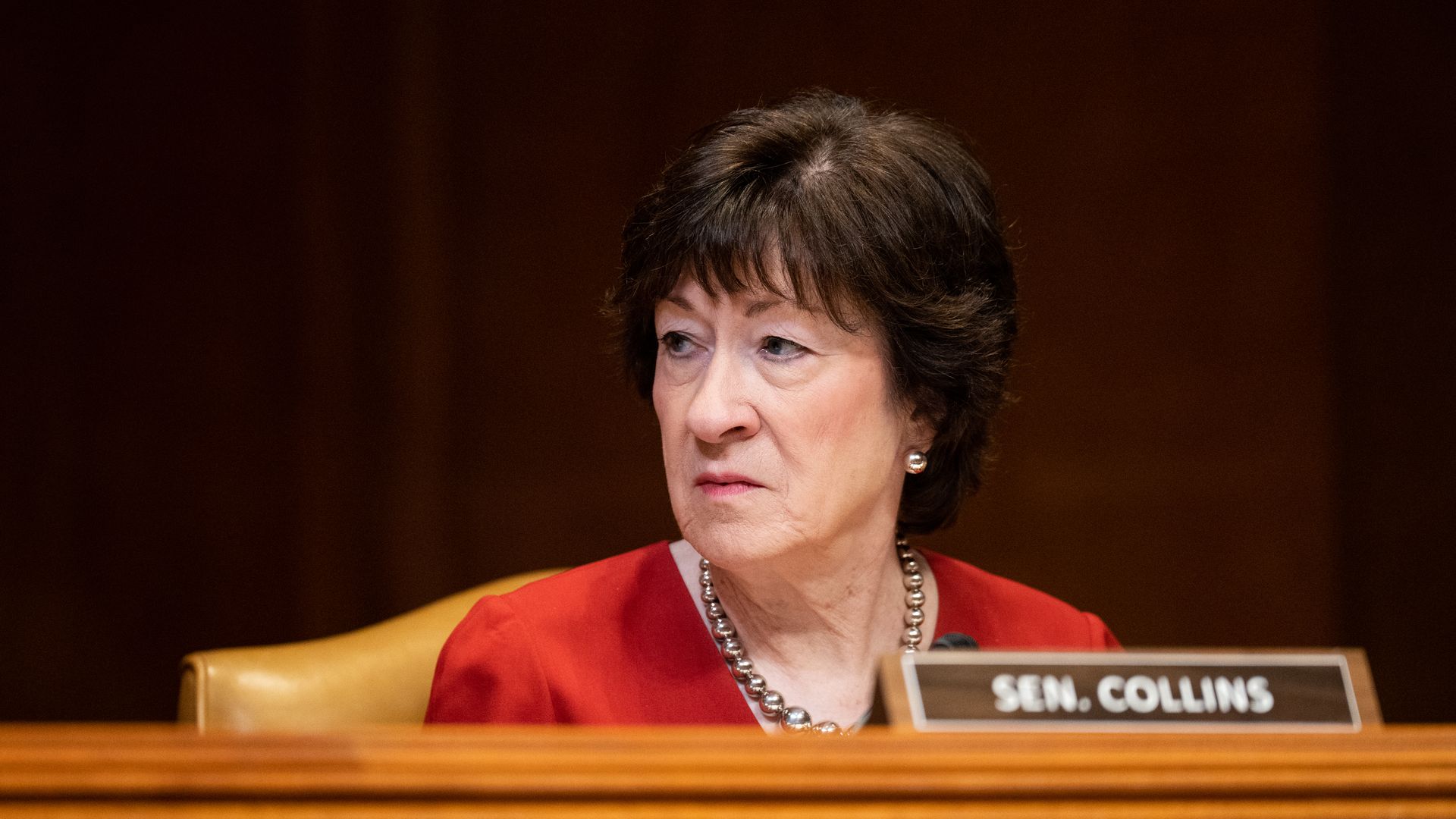 Photo of Susan Collins looking to her right