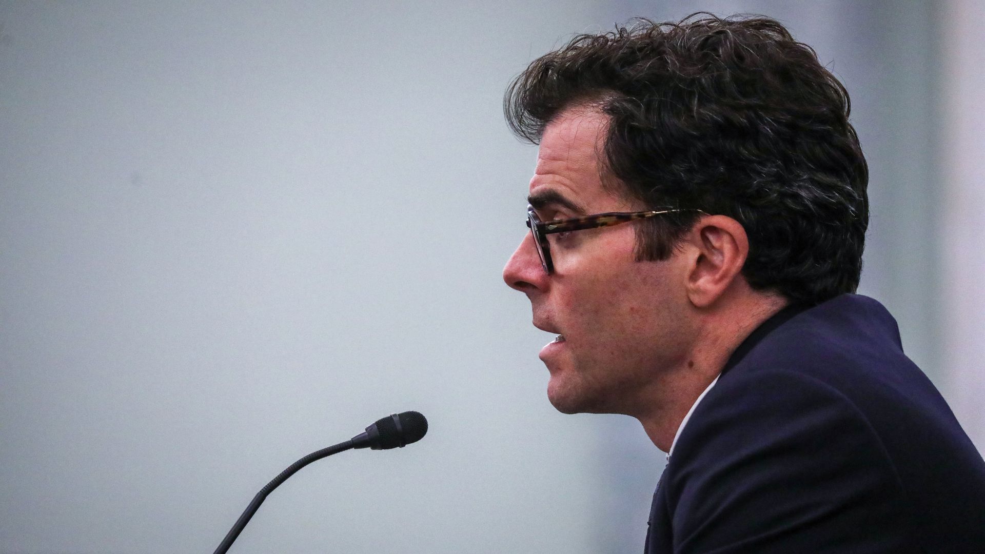 The Instagram head speaks into a microphone.