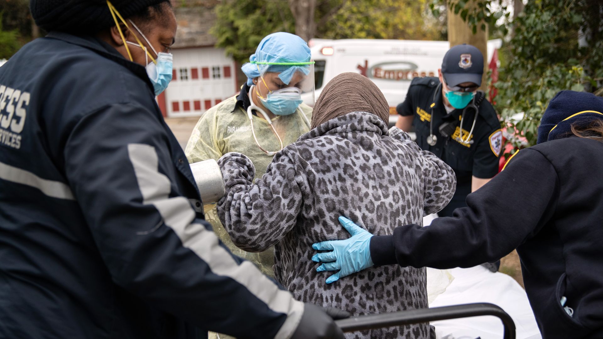 Empress EMS paramedics transport a patient with COVID-19 symptoms to a hospital