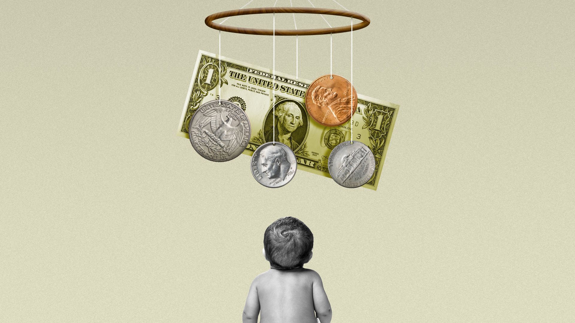 A baby from looking up at a mobile of money. 