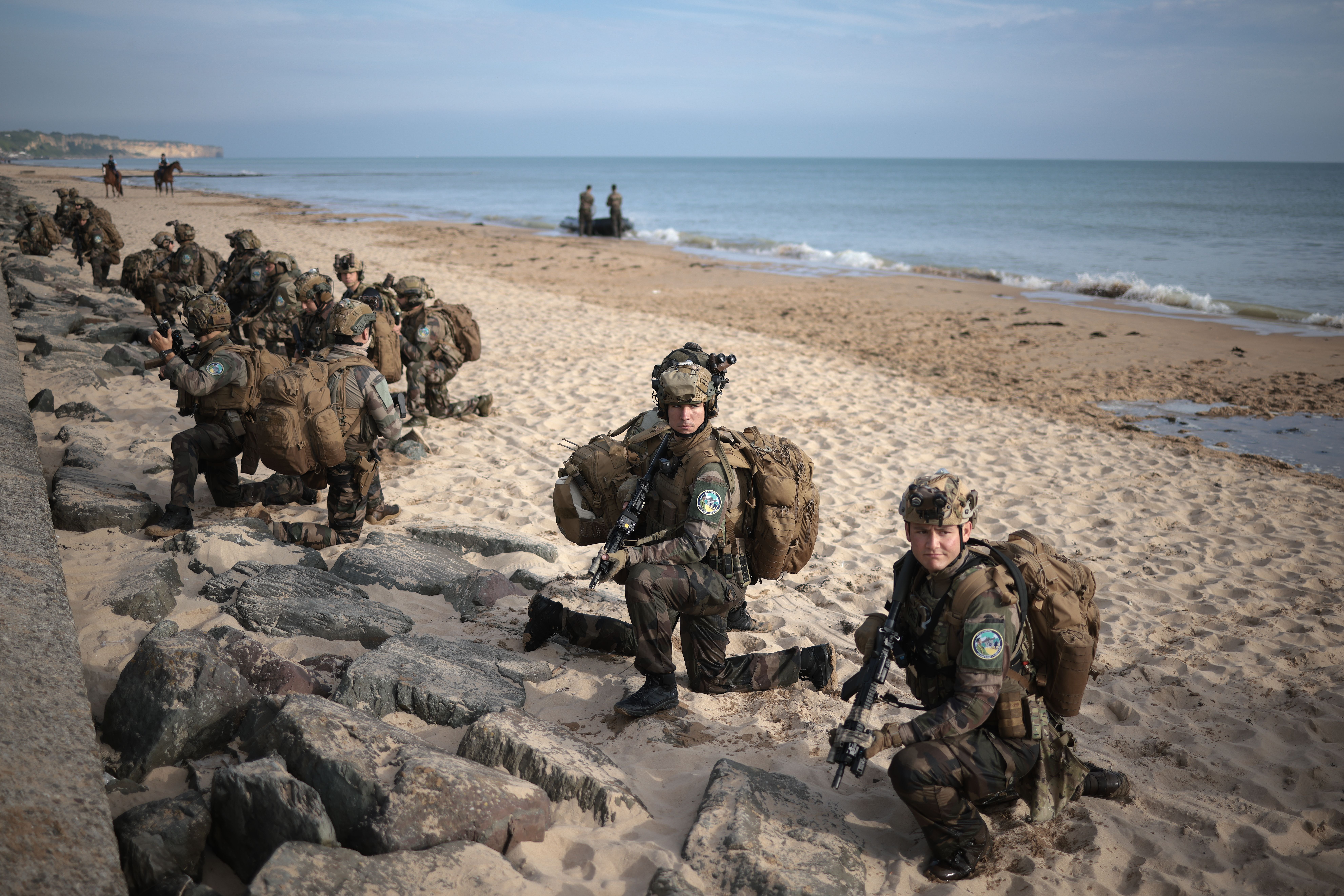 Members of the French Navy rehearse an amphibious assault landing on Omaha Beac on June 4 in Vierville-sur-Mer, France.