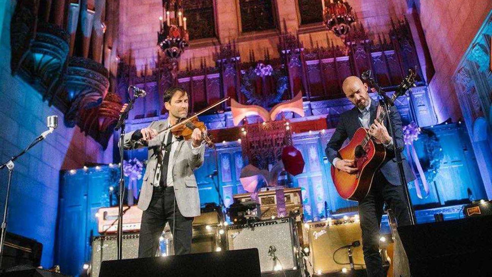 Violinist and guitarist on stage