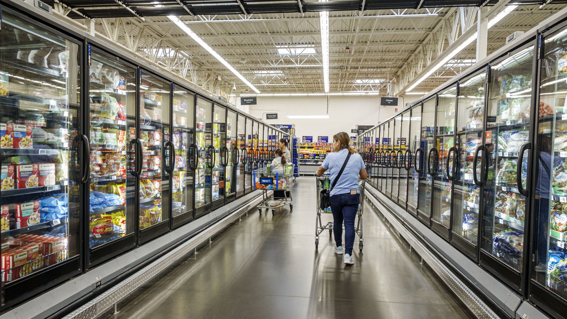 Shoppers browse the frozen food aisle at a Walmart Supercenter in Miami Doral, Fla., on Oct. 10, 2025.