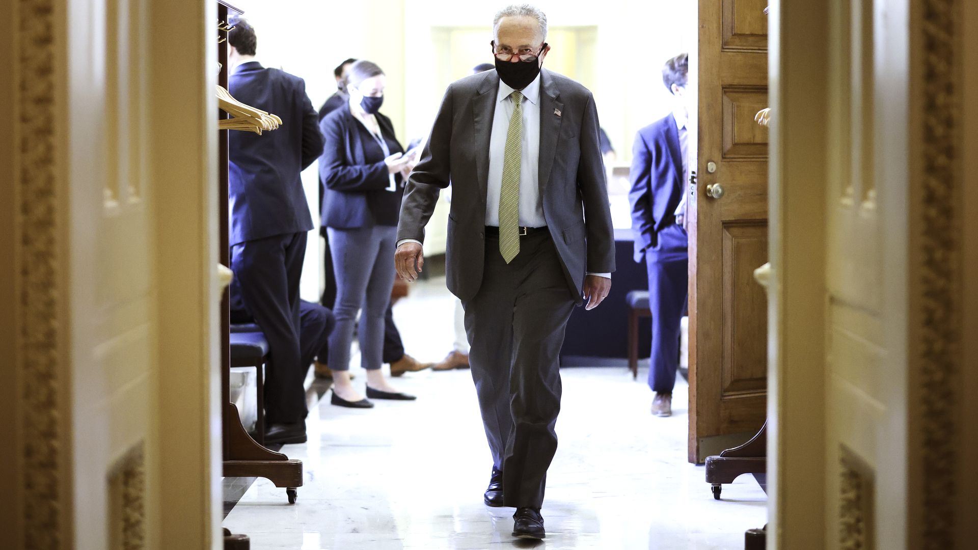 Senate Majority Leader Chuck Schumer walking through the Capitol building on Sept. 30.