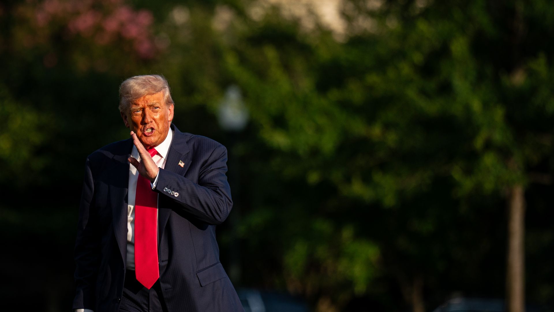 President Trump walks into the White House.
