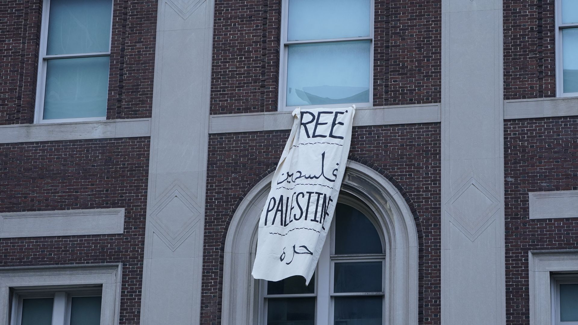 A "Free Palestine" banner hangs on a building inside Columbia University in New York city, April 30,
