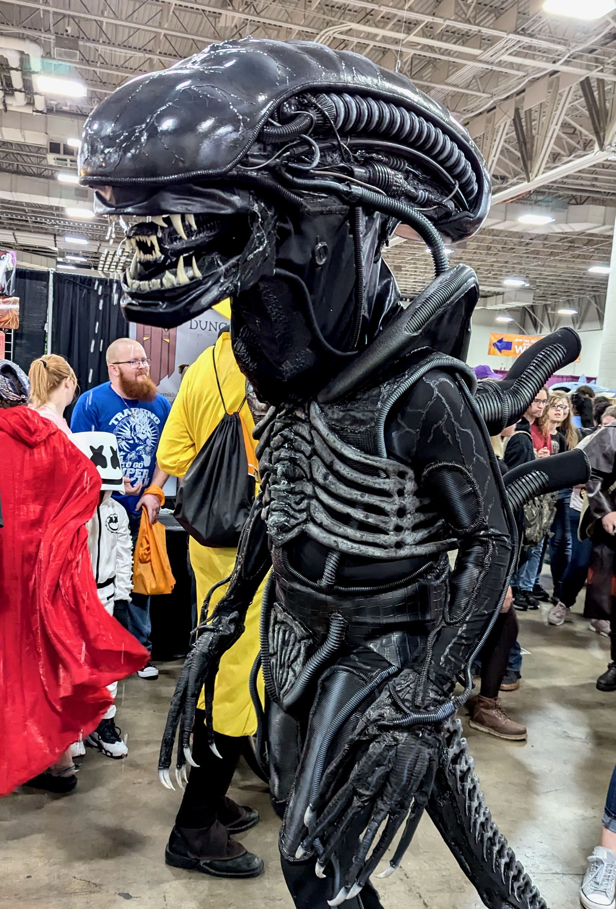 A person costumed as the alien from "Alien."