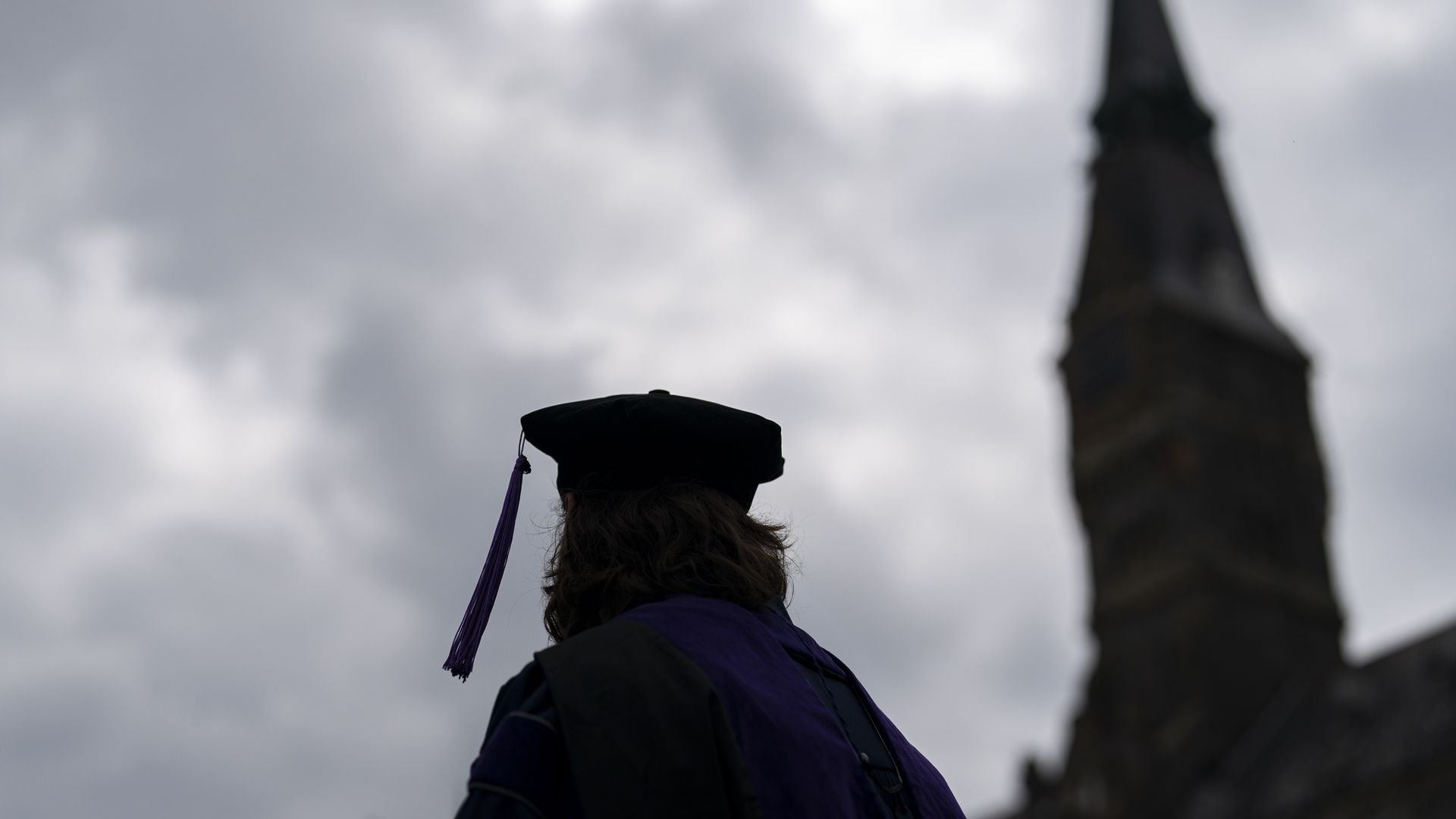 silhouette of a student in graduate cap