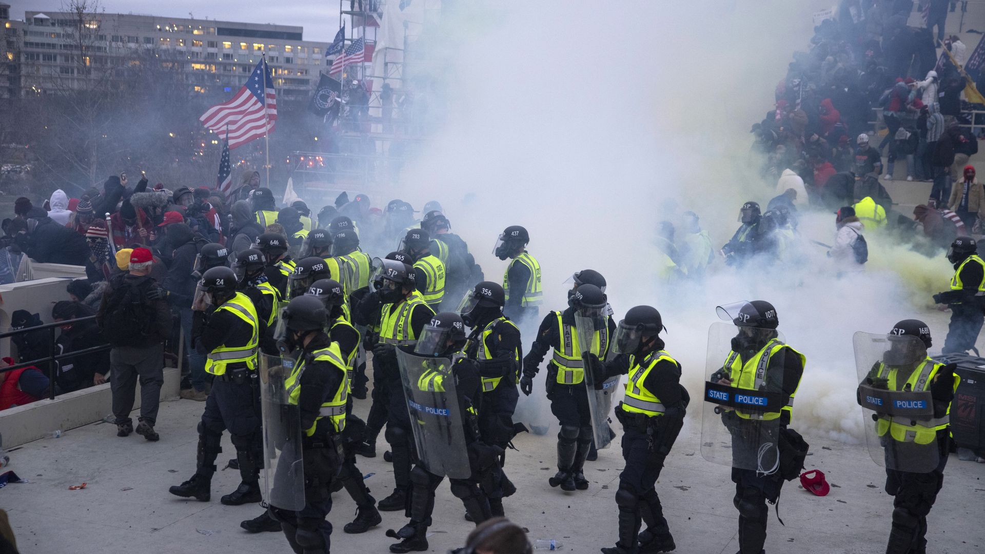 Capitol police use pepper spray and tear gas to clear the capitol. Trump supporters clashed with police and security forces as people try to storm the US Capitol in Washington D.C on January 6, 2021.