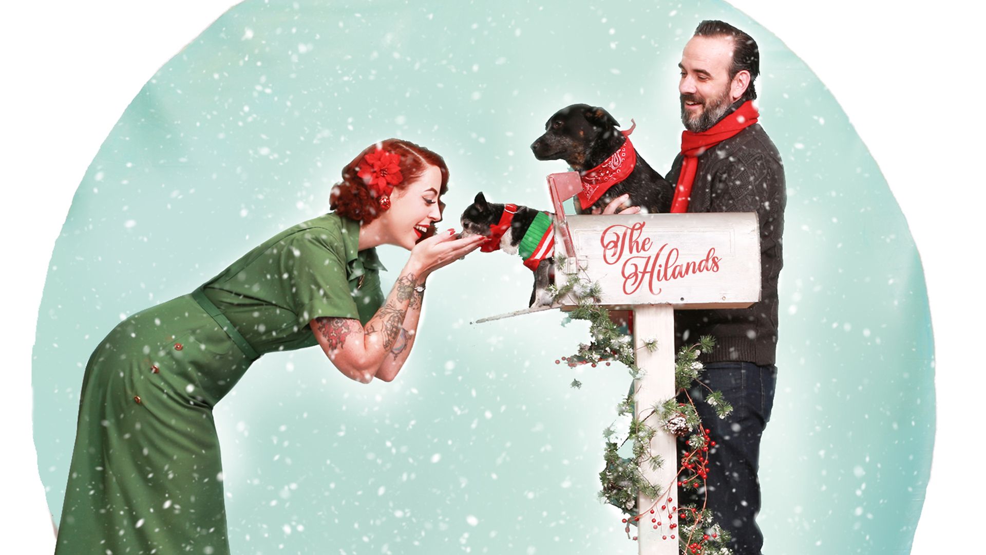 A photo of a couple in a snow globe.