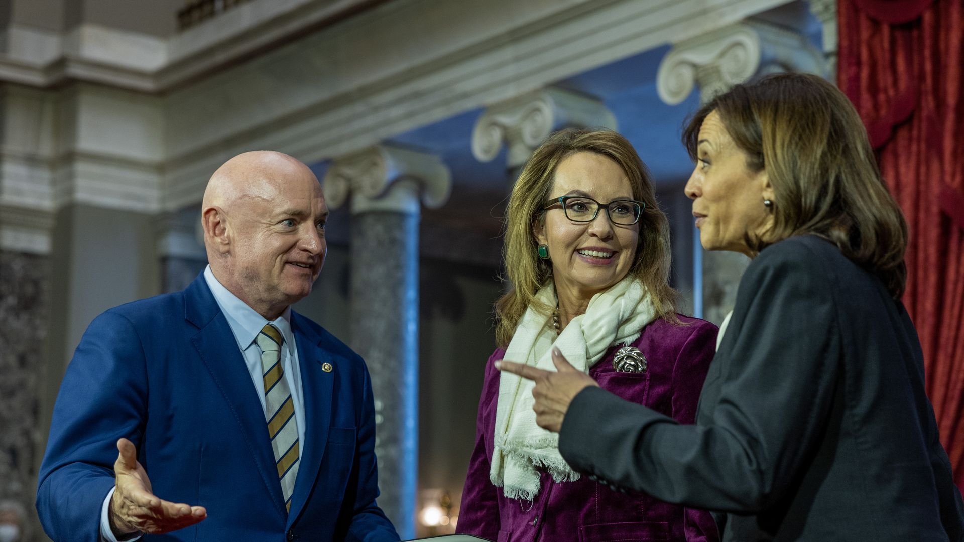 Mark Kelly, Gabrielle Giffords and Kamala Harris talk. 