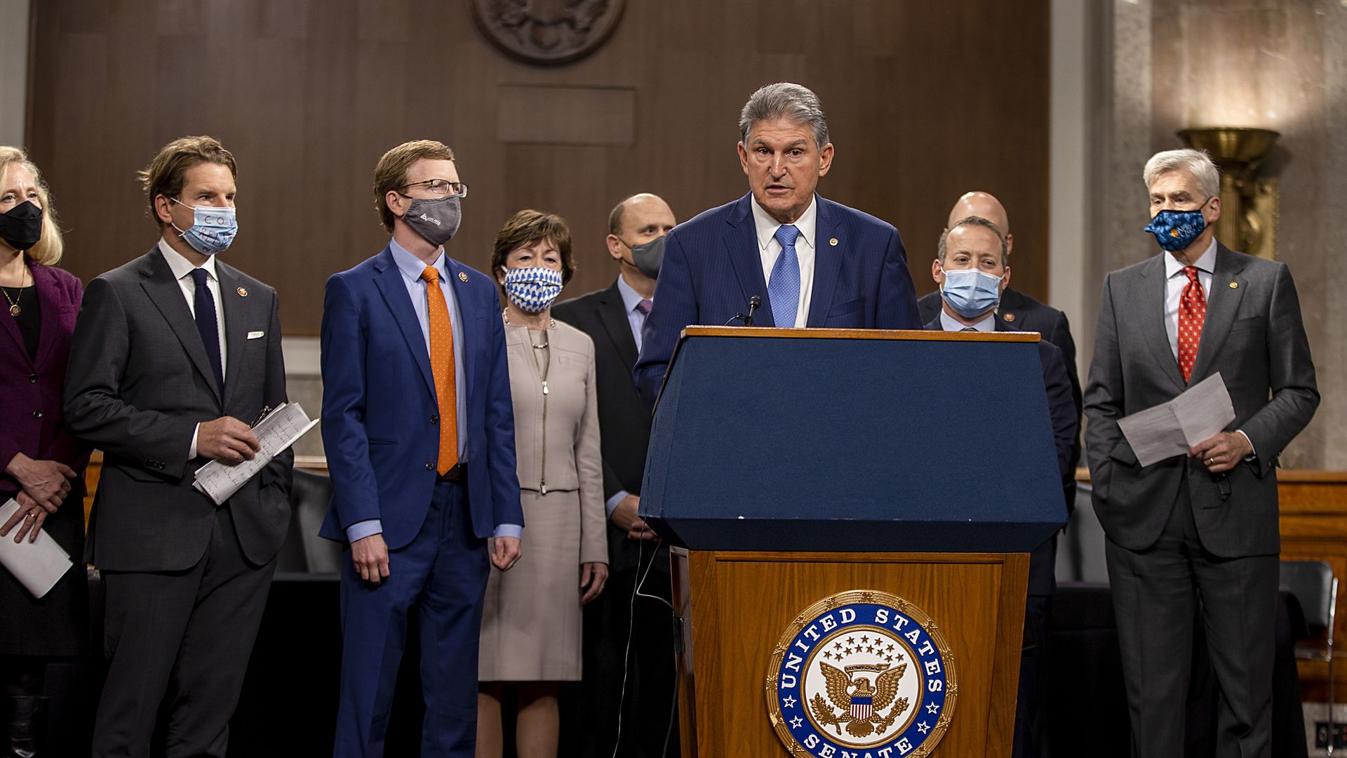 Sen. Joe Manchin (D-WV) speaks alongside a bipartisan group of Democrat and Republican members of Congress)