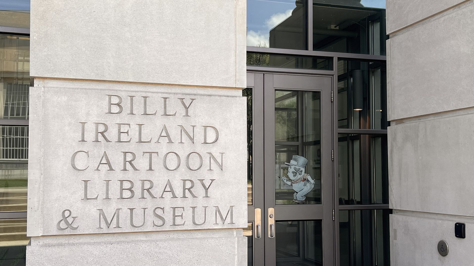 "Billy Ireland Cartoon Library & Museum at Ohio State" carved into stone outside the museum at Ohio State