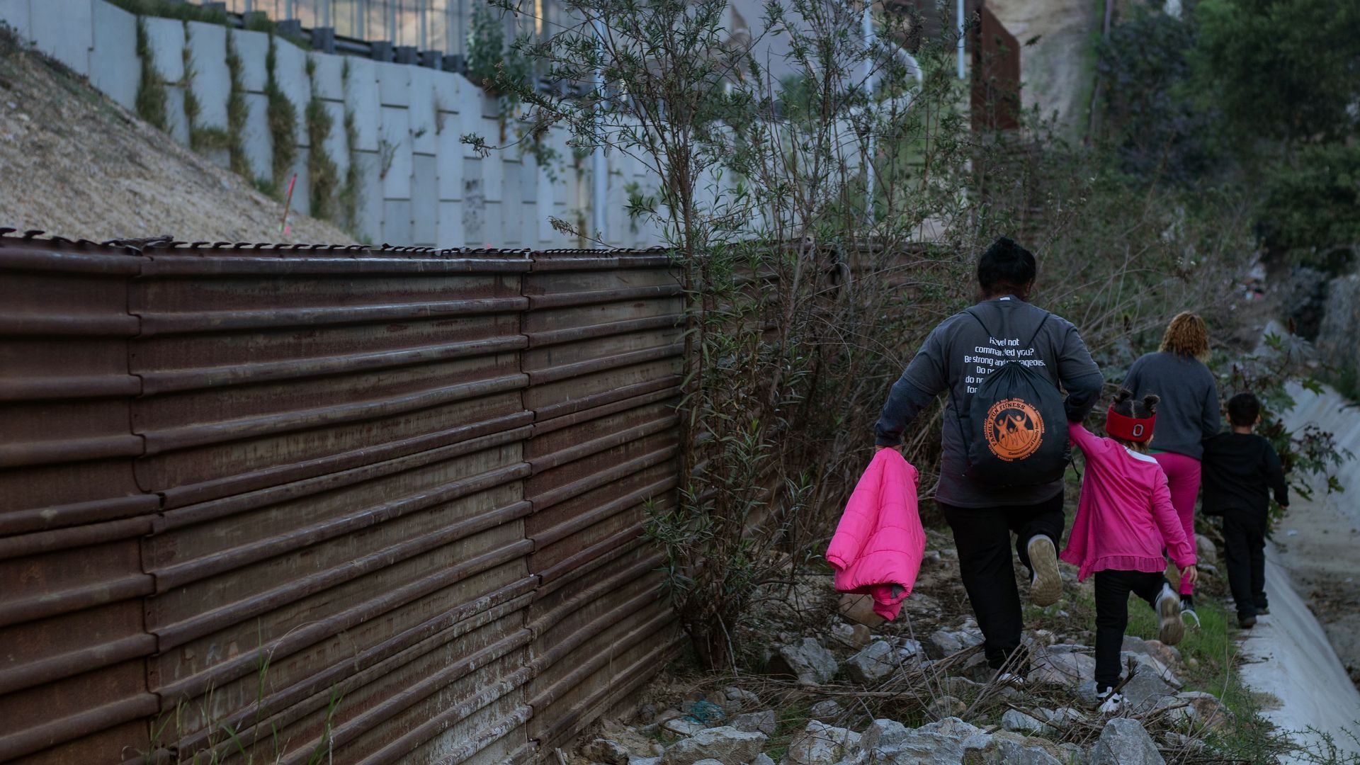 Migrants at the border running